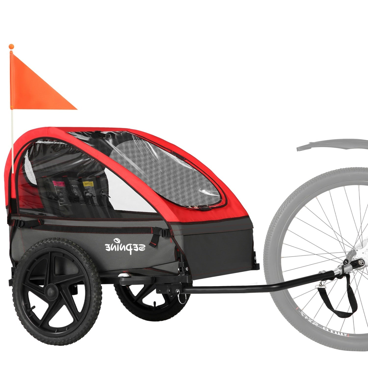 Ein rot-grauer Fahrradanhänger an einem Fahrradrad mit einer orangefarbenen Sicherheitsflagge und schwarzen Rädern.