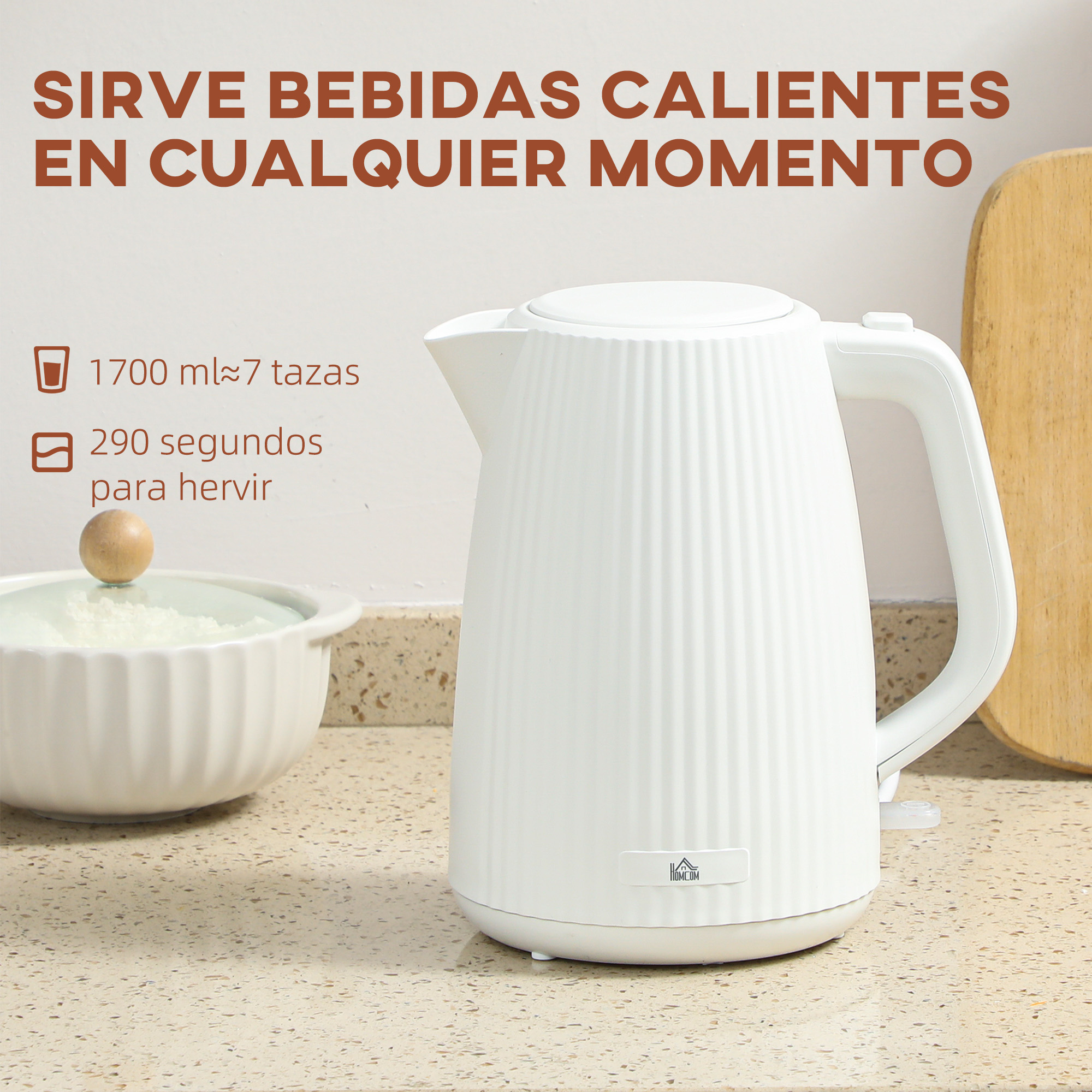 Un hervidor eléctrico blanco sobre una encimera de cocina junto a un bol blanco y texto.