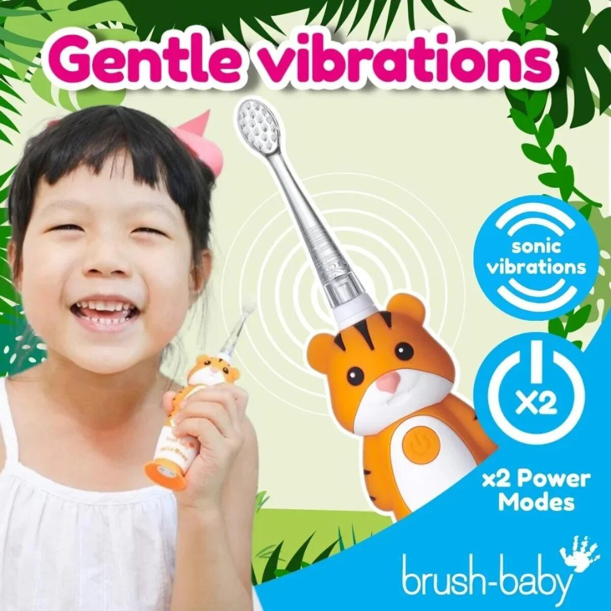 Felice bambino che tiene uno spazzolino elettrico a forma di tigre per bambini con testo sulle vibrazioni delicate.
