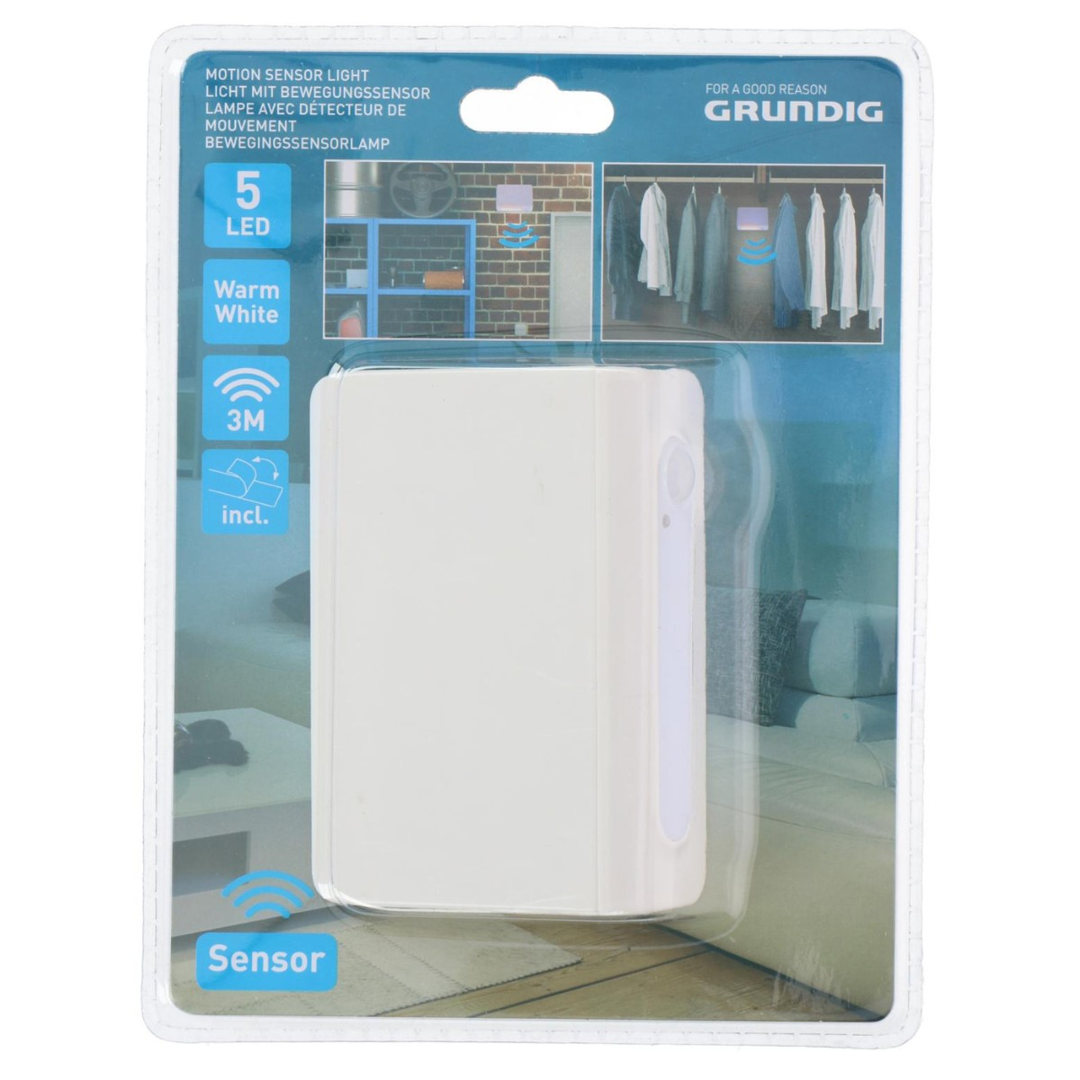 Verpakte Grundig witte LED bewegingssensor lamp met productinfo.