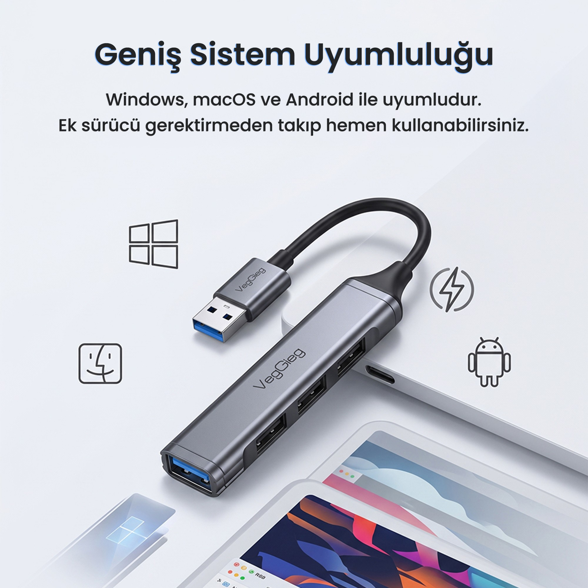 Çoklu portlu gri VegGieg USB çoklayıcı, açık renkli arkaplanda sistem simgeleriyle.