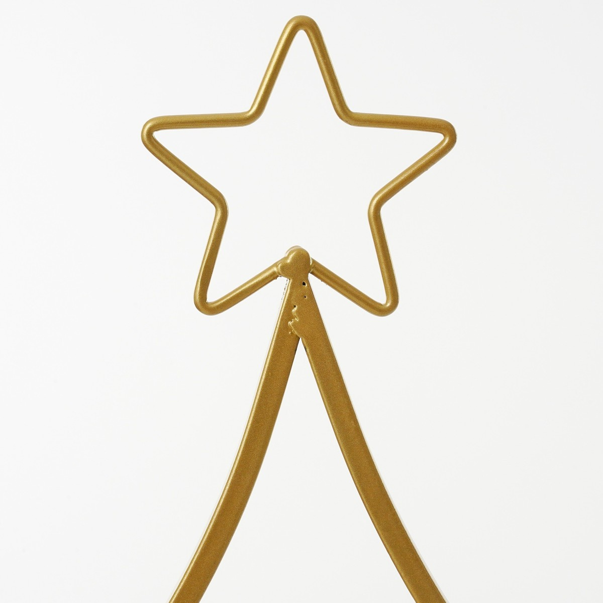 A gold-colored, star-shaped metal frame on a plain background.