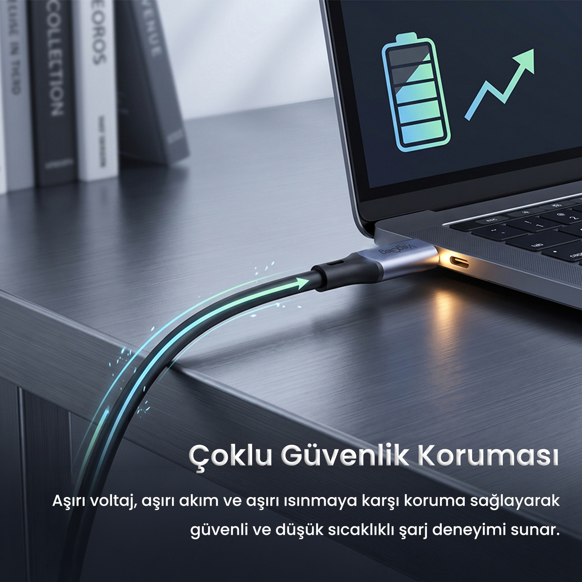 Ekranında pil ve yükselen grafik simgesi olan bir dizüstü bilgisayara takılı bir şarj kablosu.