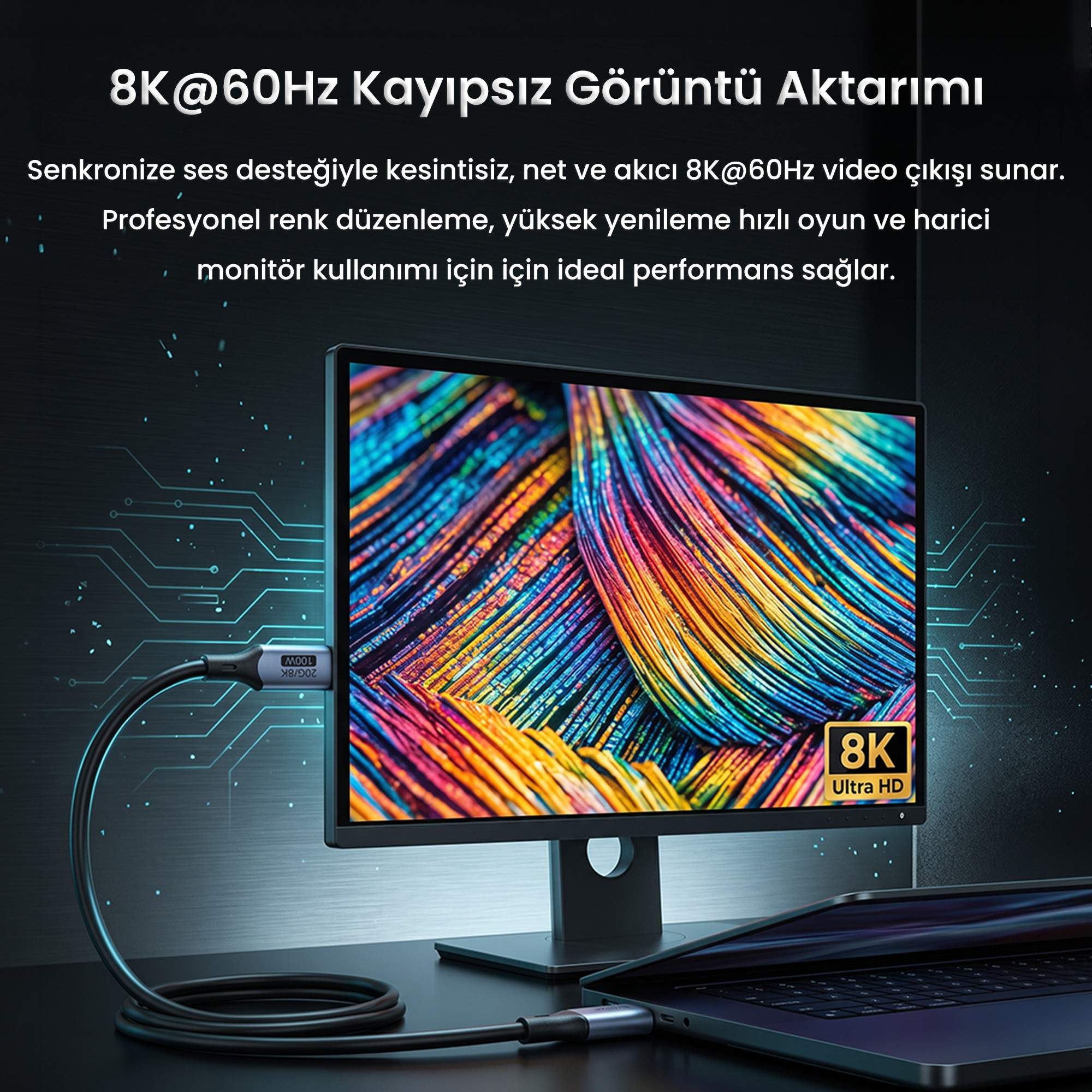 Bir kablo, renkli soyut bir görüntü gösteren bir monitörü dizüstü bilgisayara bağlar.