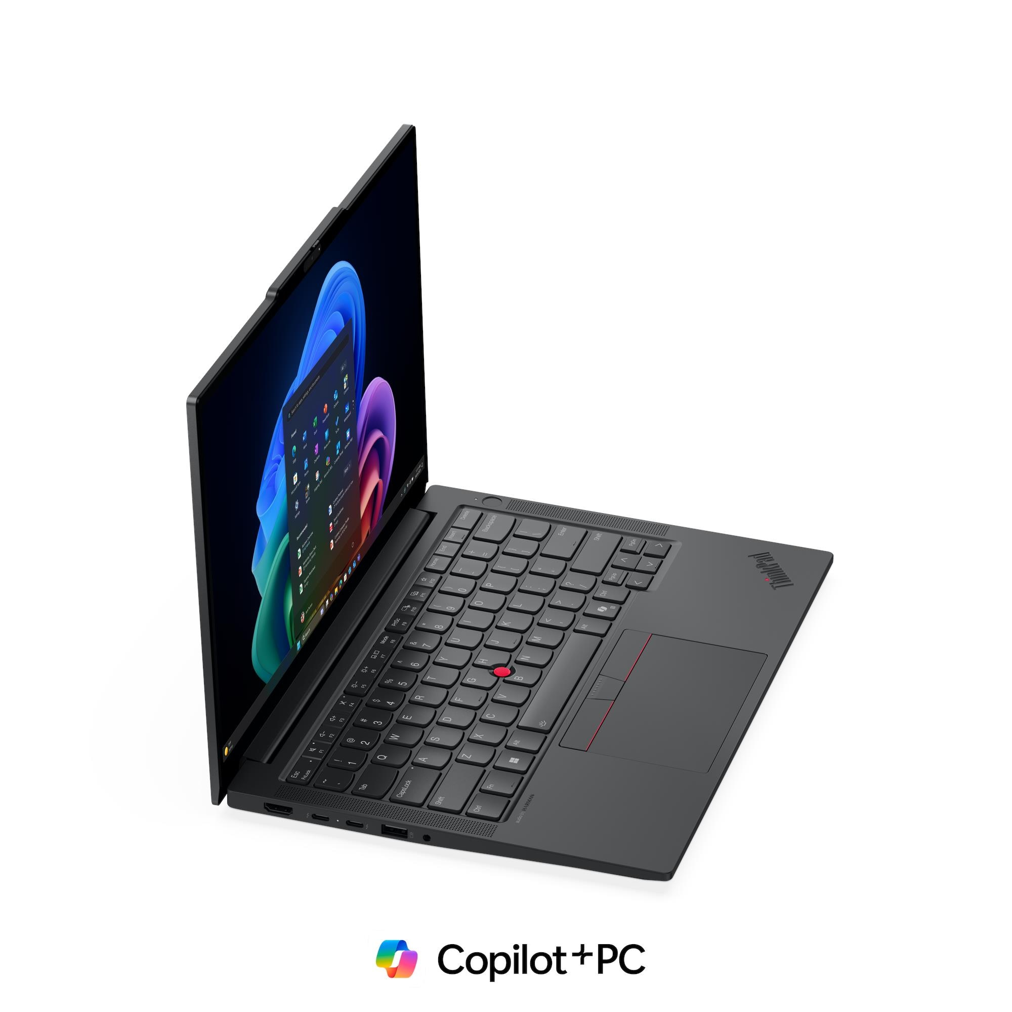 Un laptop ThinkPad nero visto dall'alto, con uno sfondo astratto blu sullo schermo.