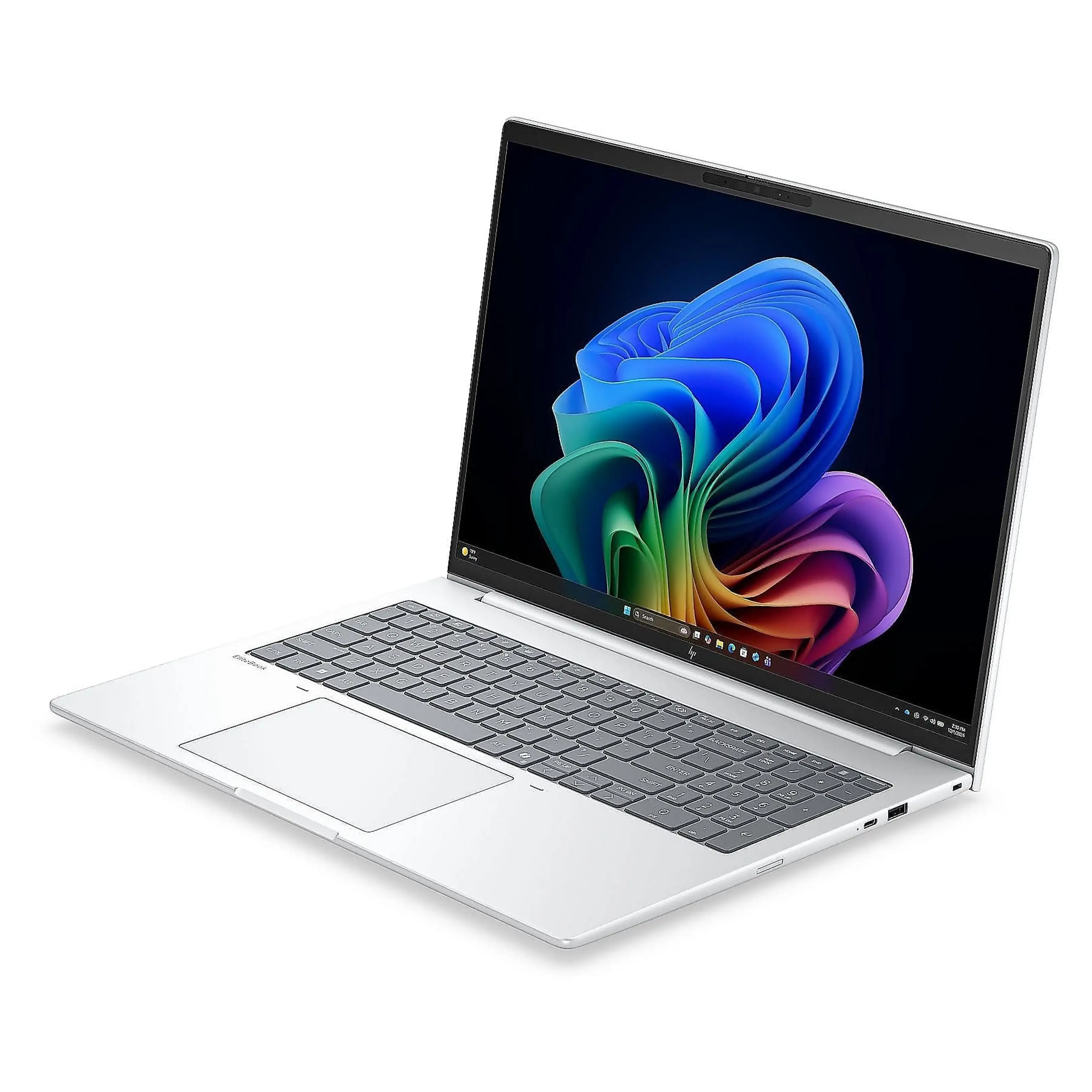 Un laptop argento con uno sfondo astratto colorato e tastiera grigia, visto da un'angolazione di tre quarti.