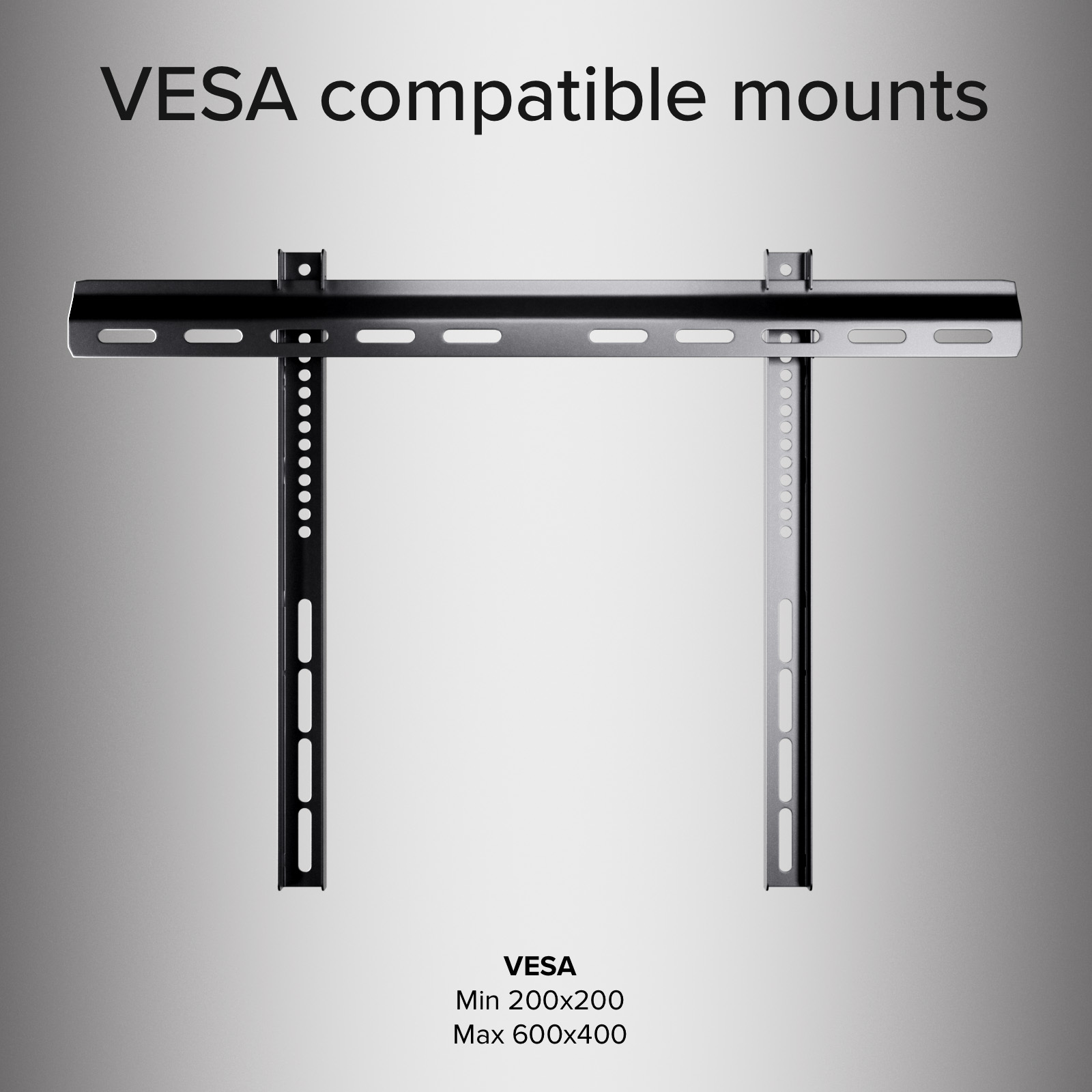 Un soporte de TV compatible con VESA negro sobre fondo gris con texto que especifica los límites de tamaño.