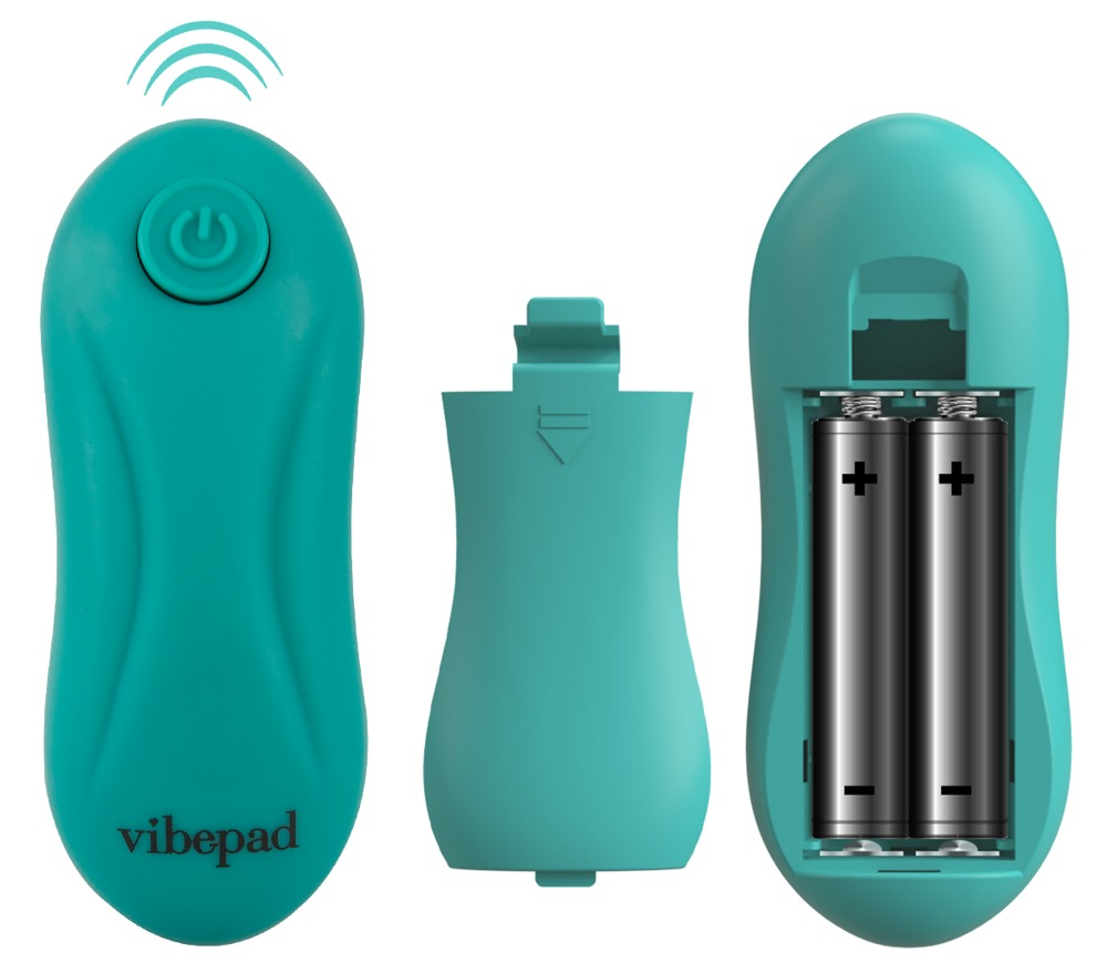 Türkisfarbene vibepad-Fernbedienung mit Knöpfen, Batteriefachdeckel und zwei eingelegten Batterien.