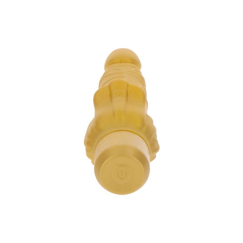 Un juguete sexual amarillo texturizado con un botón de encendido redondo en la parte inferior, sobre fondo blanco.