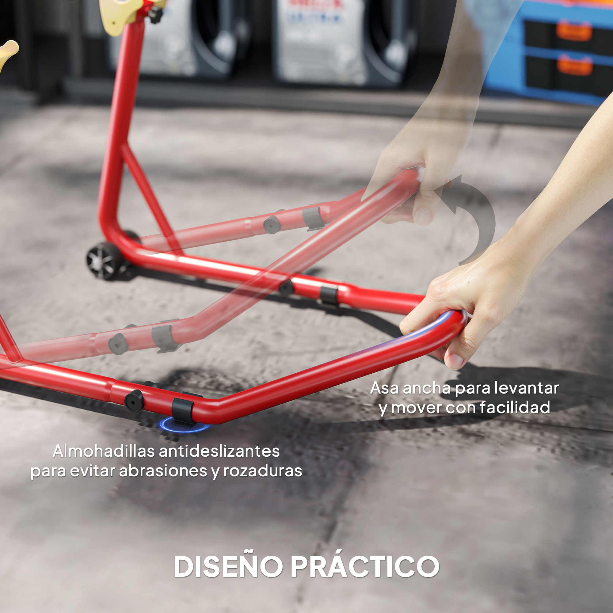 Manos operando un soporte de moto rojo en un garaje, con asa y almohadillas antideslizantes y etiquetas en español.