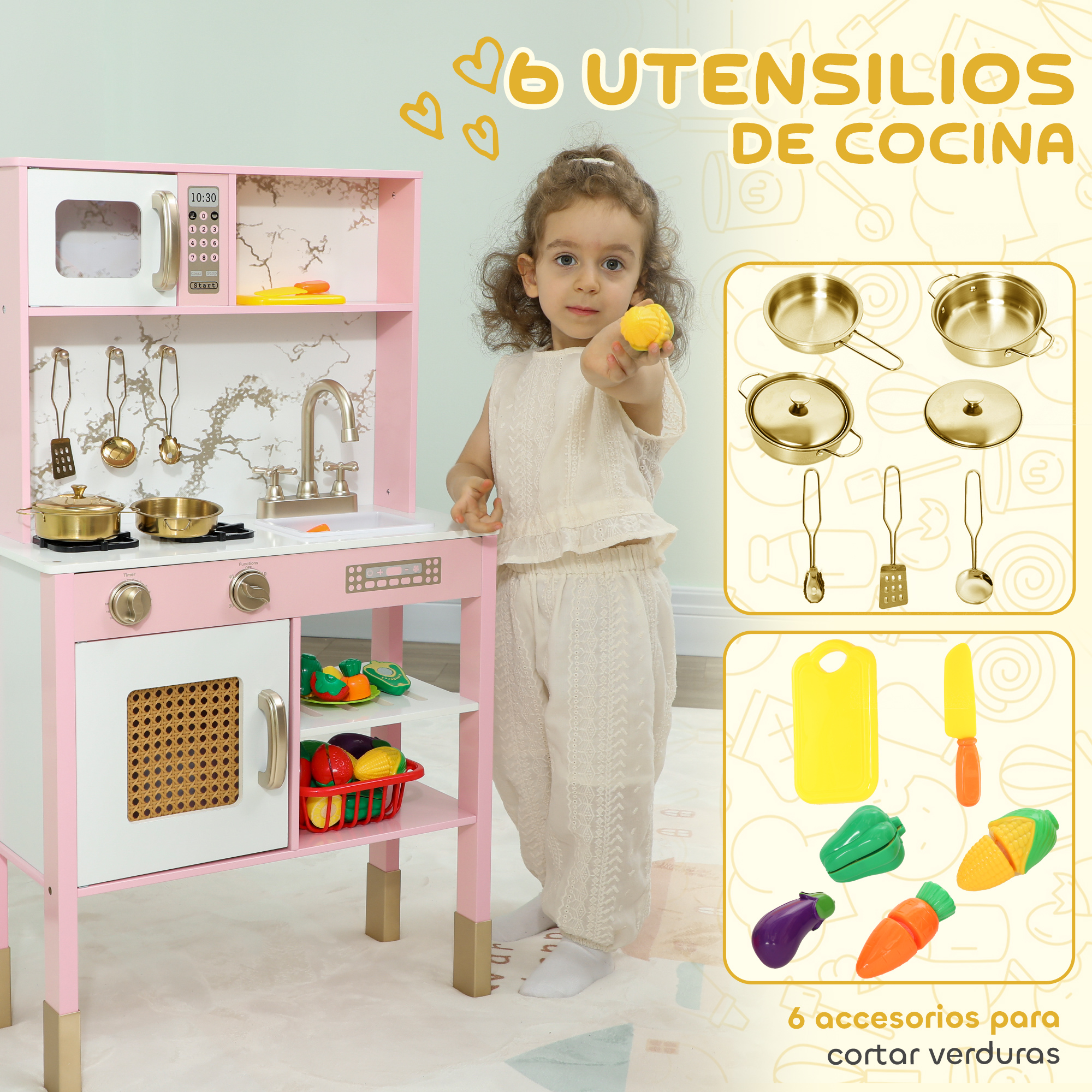 Una niña sostiene un juguete de verdura junto a una cocinita de juguete rosa, con inserciones de menaje y verduras.