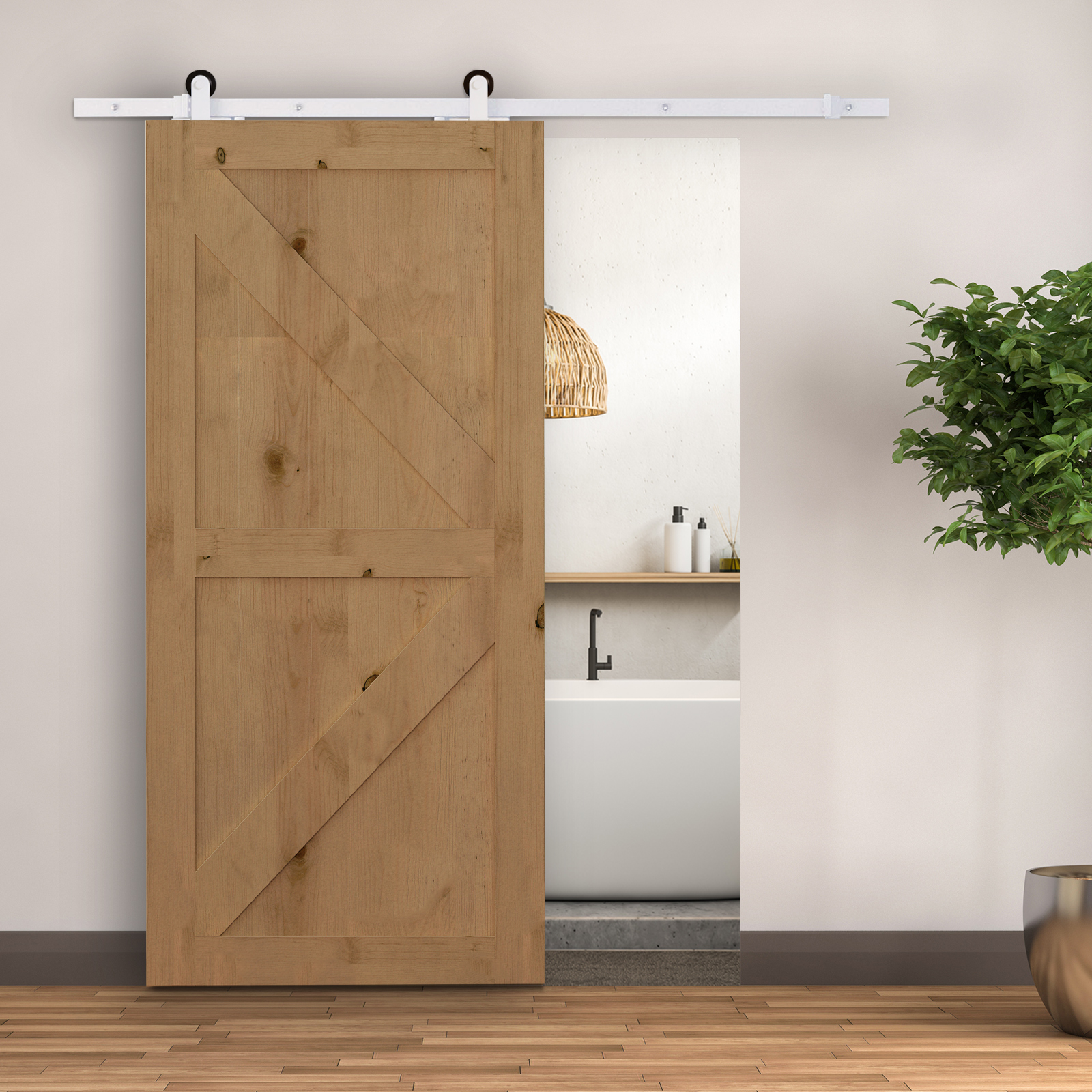 Una puerta corredera de madera en una pared blanca con una planta en maceta al lado, mostrando un baño.