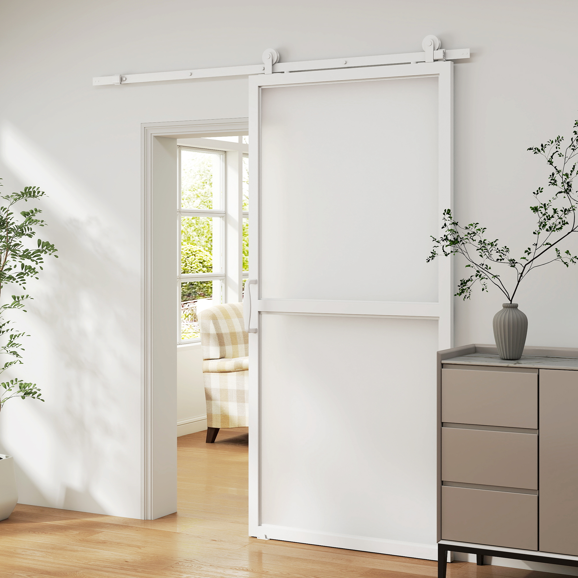 Una puerta corredera blanca con un mueble gris y plantas ante una pared blanca.