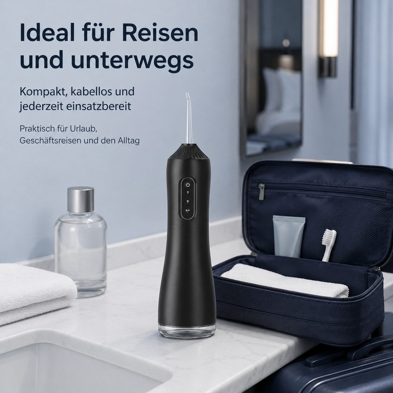 Ein schwarzer kabelloser Munddusche auf einer Badezimmertheke neben einer Reisetasche.