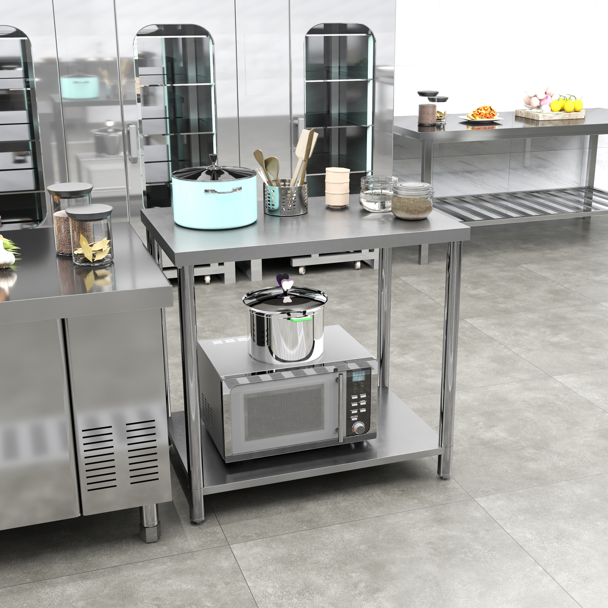 Cocina comercial de acero inoxidable con microondas, ollas en una mesa de preparación, tarros y utensilios.