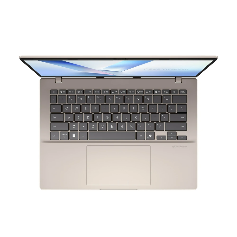 Un laptop ASUS VivoBook aperto di colore dorato visto dall'alto, con tastiera nera e schermo blu.