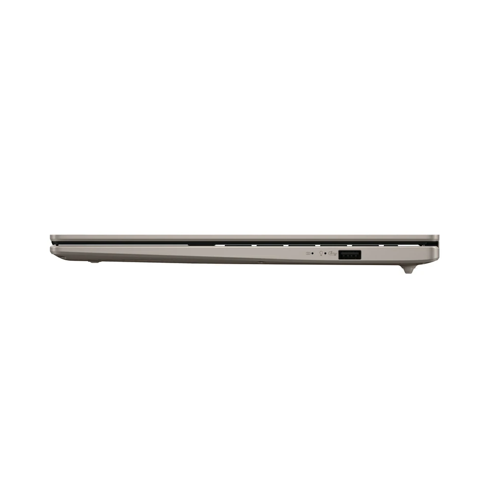 Vista laterale di un laptop grigio chiuso, con porta USB visibile e LED di stato su sfondo bianco.