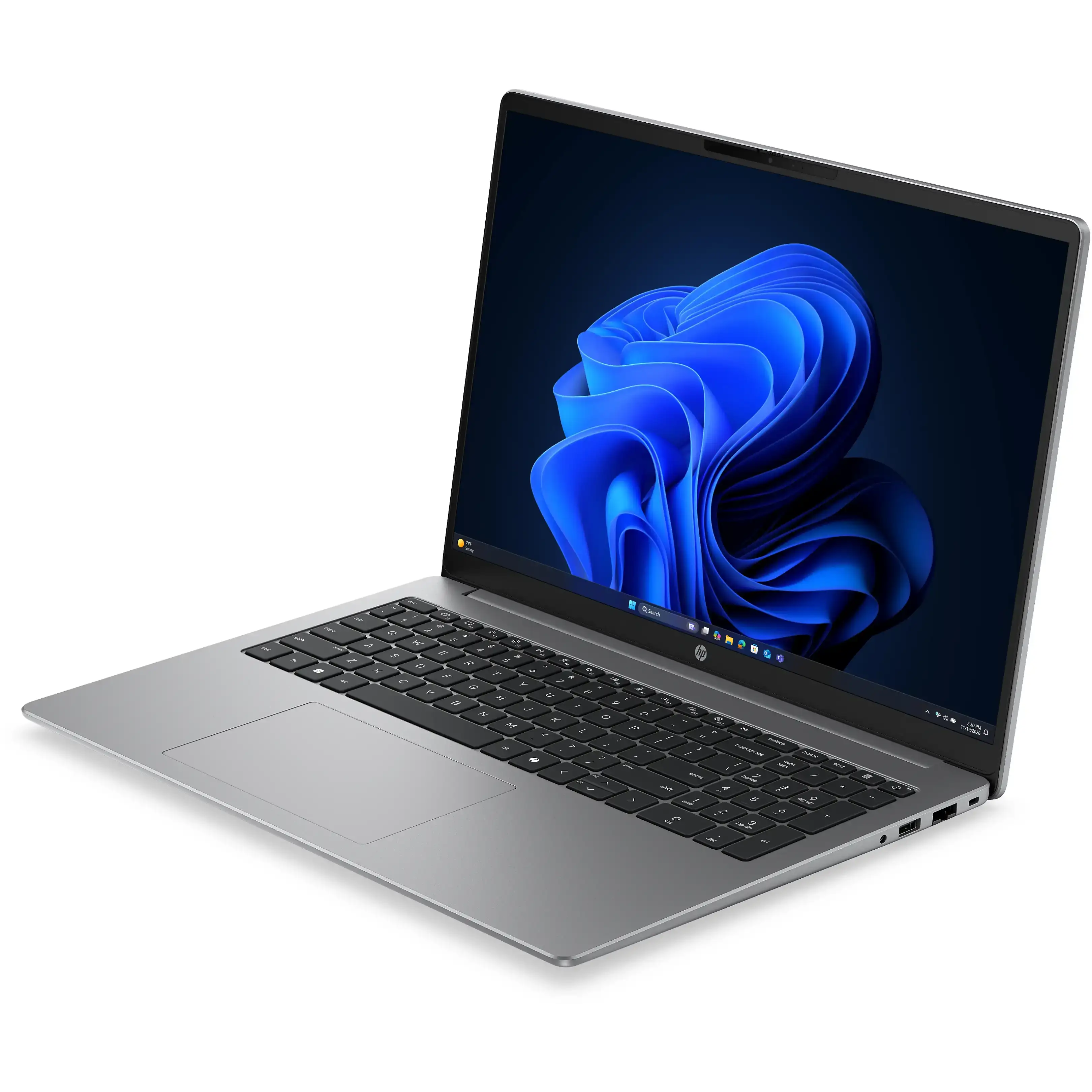 Un computer portatile argentato con tastiera nera e sfondo d'onda blu su sfondo bianco.