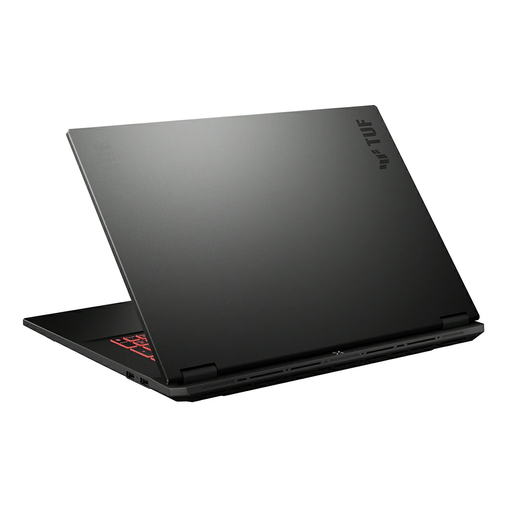 Un computer portatile da gioco ASUS TUF nero chiuso visto da dietro, che mostra il coperchio e la tastiera rossa.