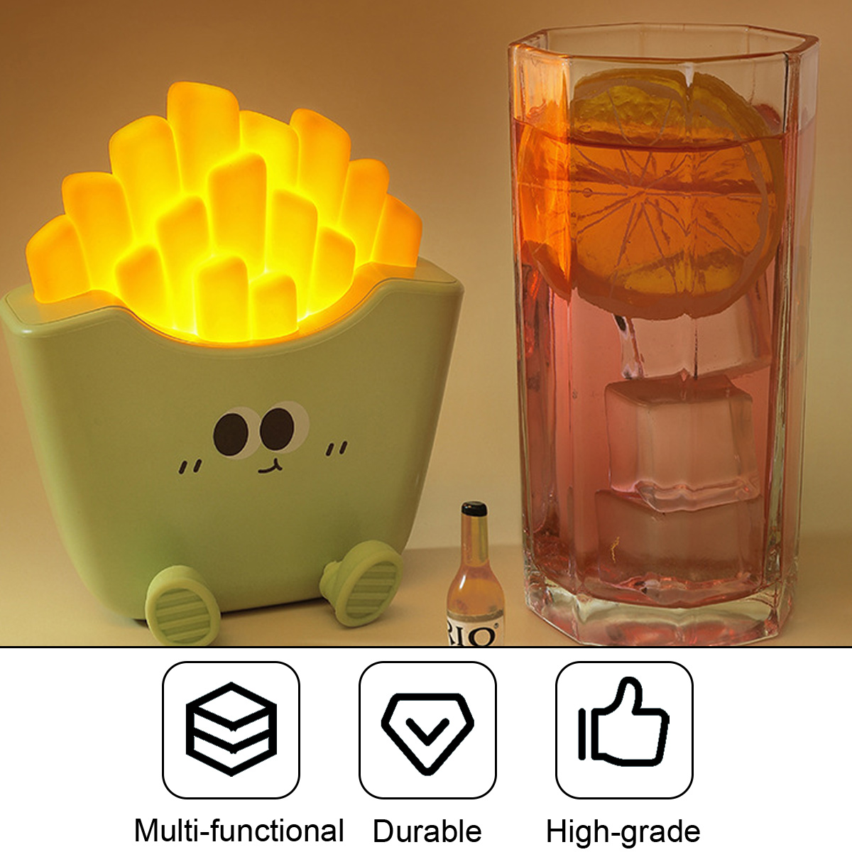 Eine Pommes-Nachtlampe mit Gesicht, ein Getränk mit Zitrone und drei Produktsymbole.