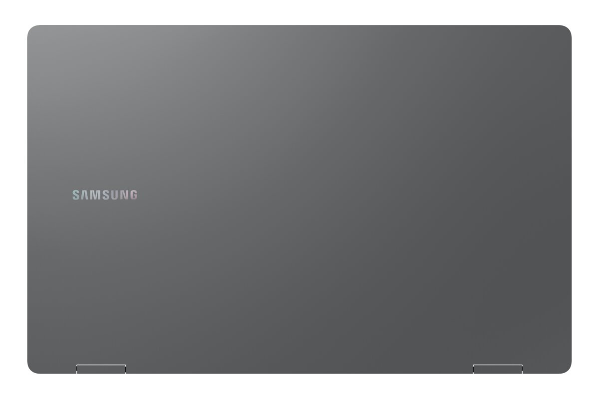 Laptop grigio Samsung chiuso visto dall'alto con cerniere visibili in basso.