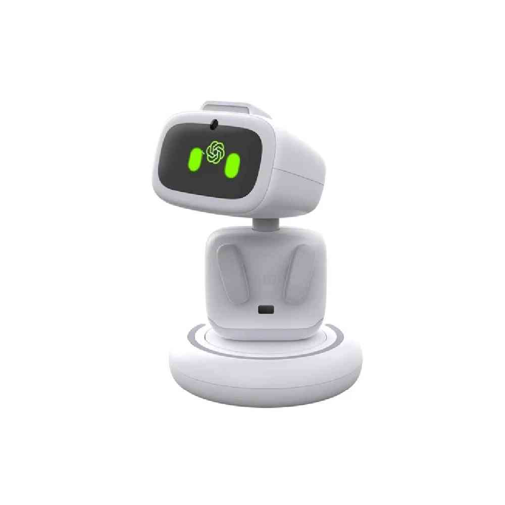 Yeşil bir yüz gösteren ekrana sahip küçük beyaz bir robot yuvarlak bir taban üzerinde duruyor.