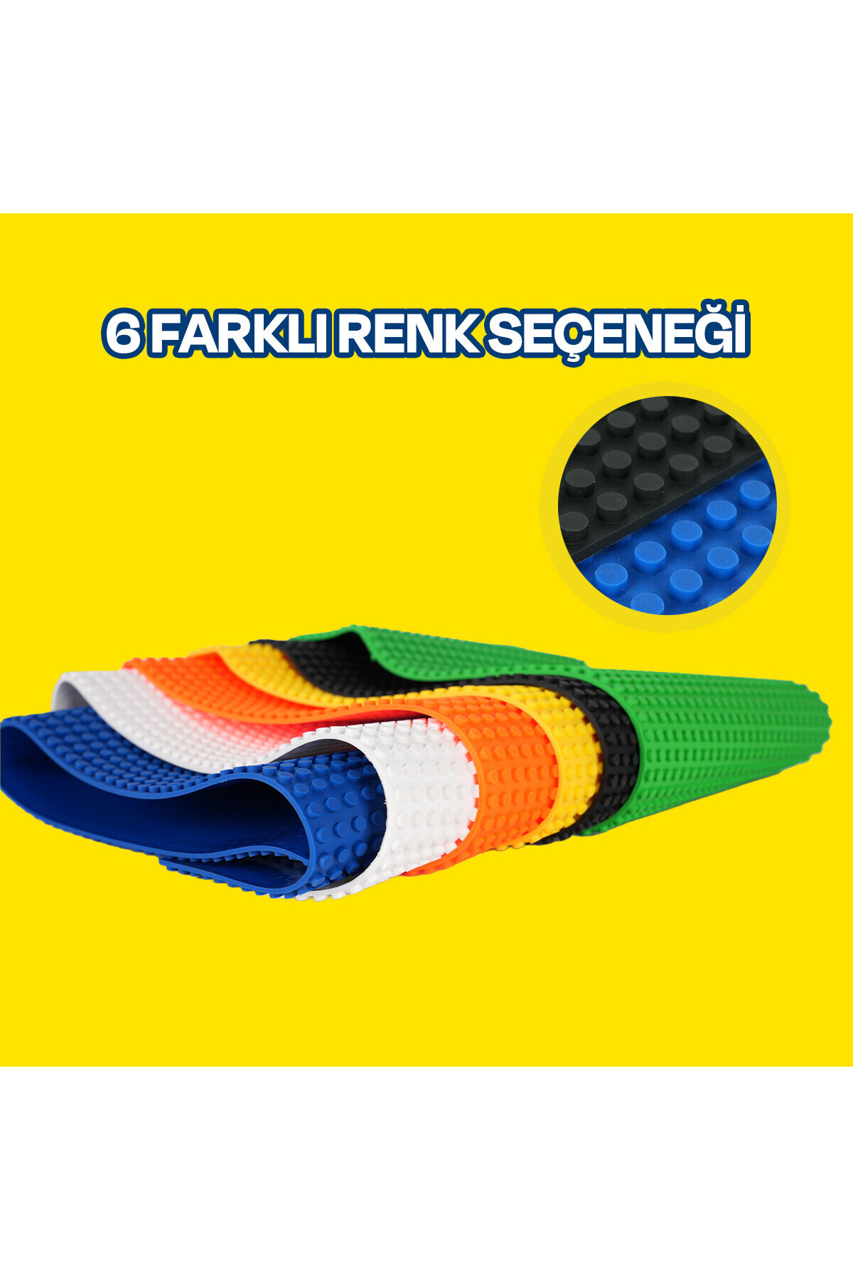 Sarı arka planda mavi, beyaz, turuncu, sarı, siyah ve yeşil renklerde renkli, esnek yapı matları.
