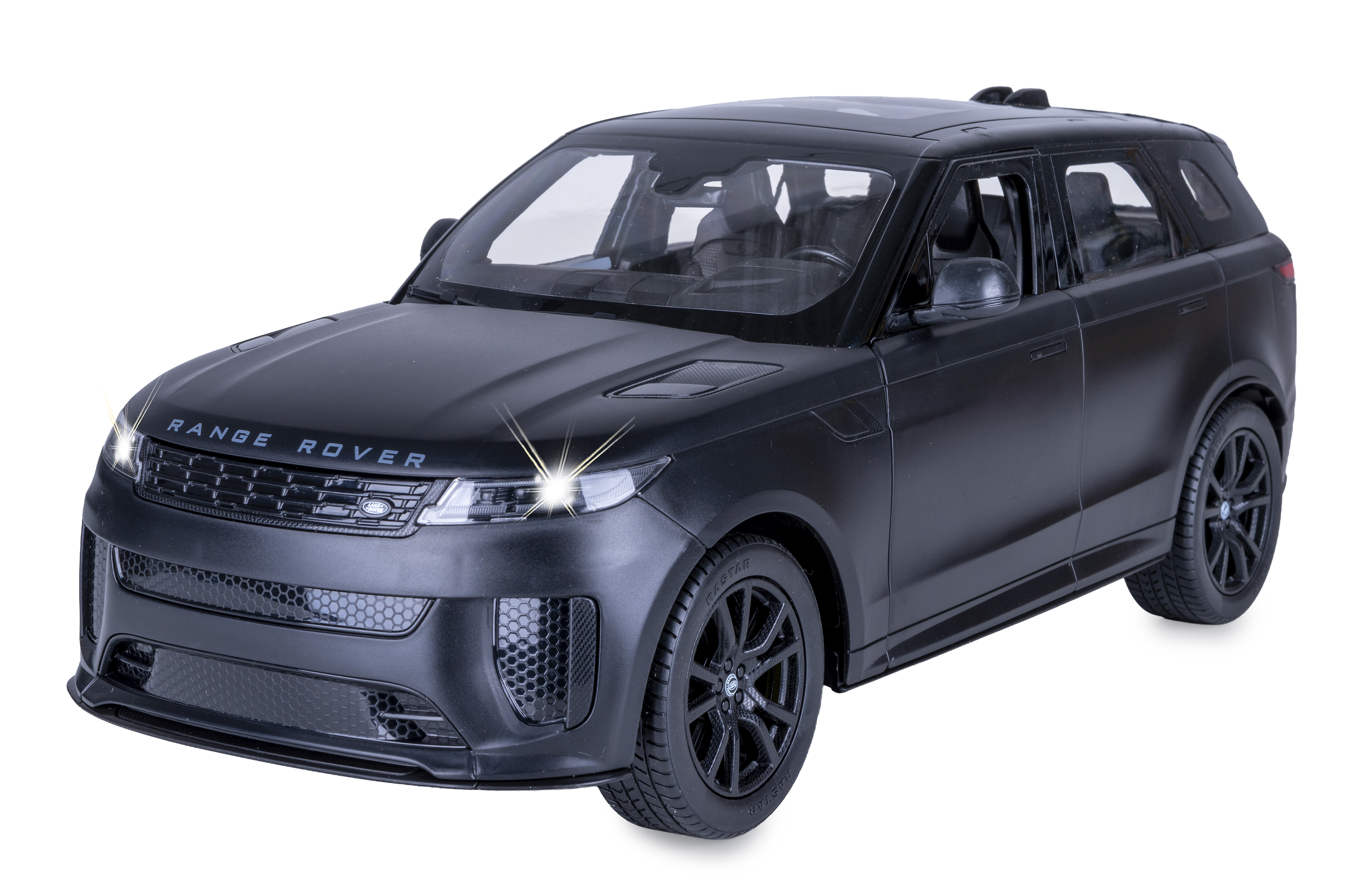Ein matt schwarzes Range Rover Modellauto mit leuchtenden Scheinwerfern vor weißem Hintergrund.