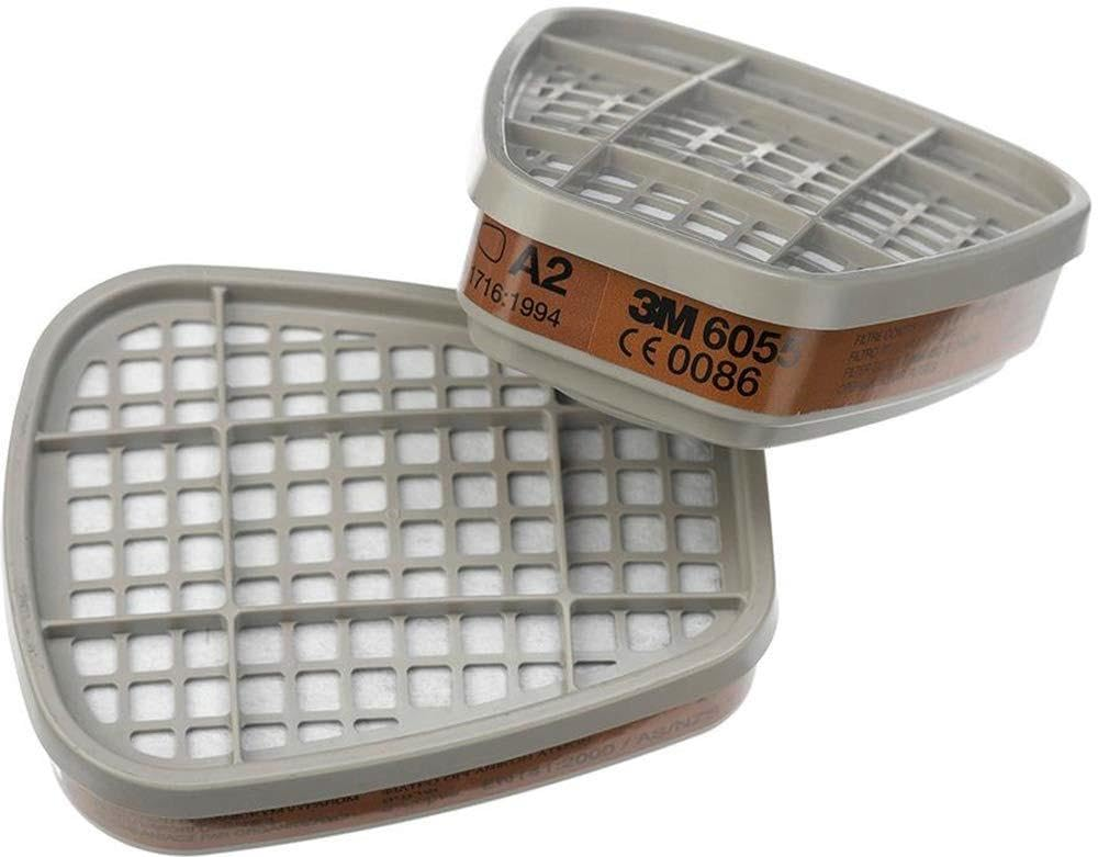 Deux filtres respiratoires gris 3M 6055 A2 sur fond blanc.