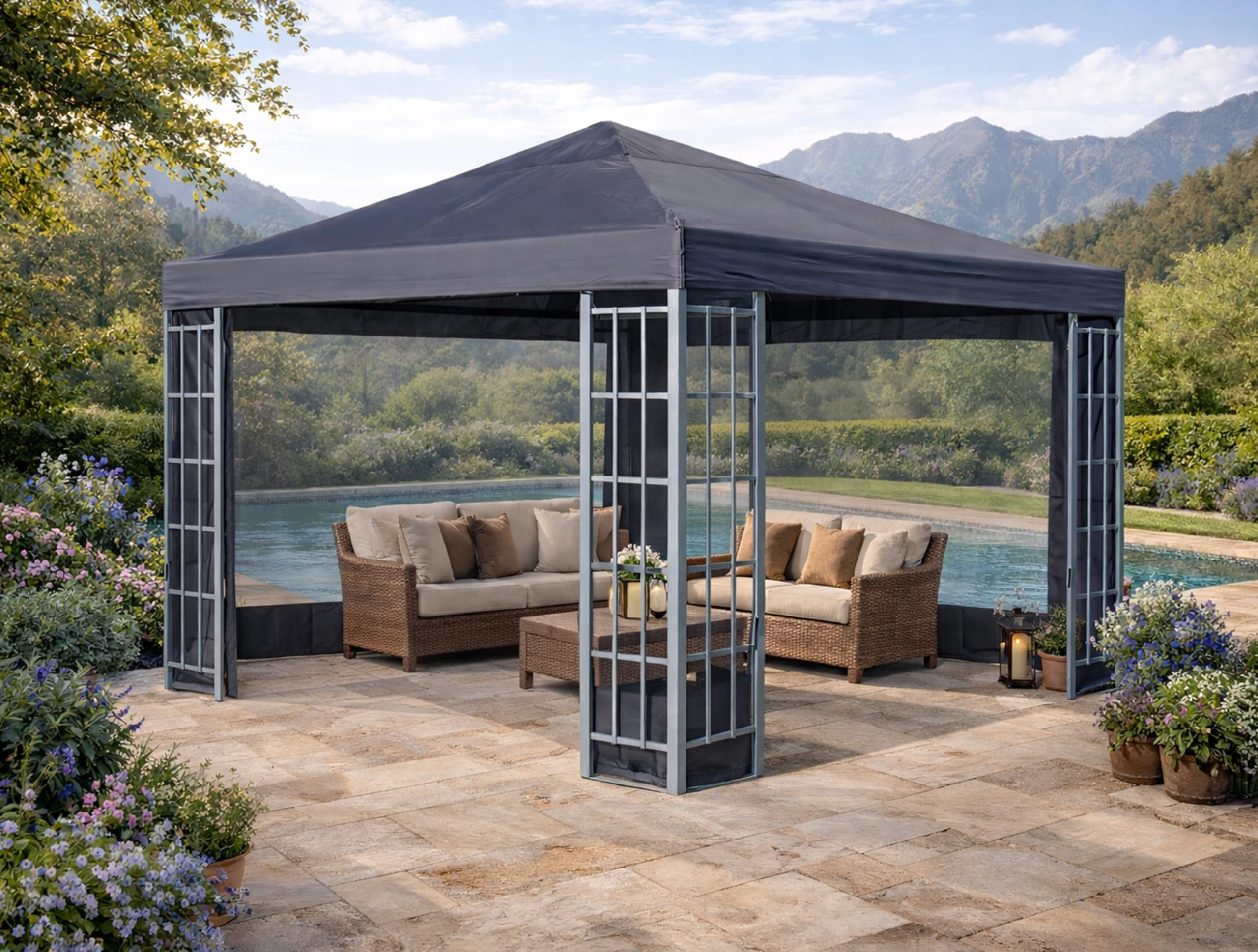 Ein grauer Pavillon mit Loungemöbeln steht am Poolrand auf einer Steinterrasse.