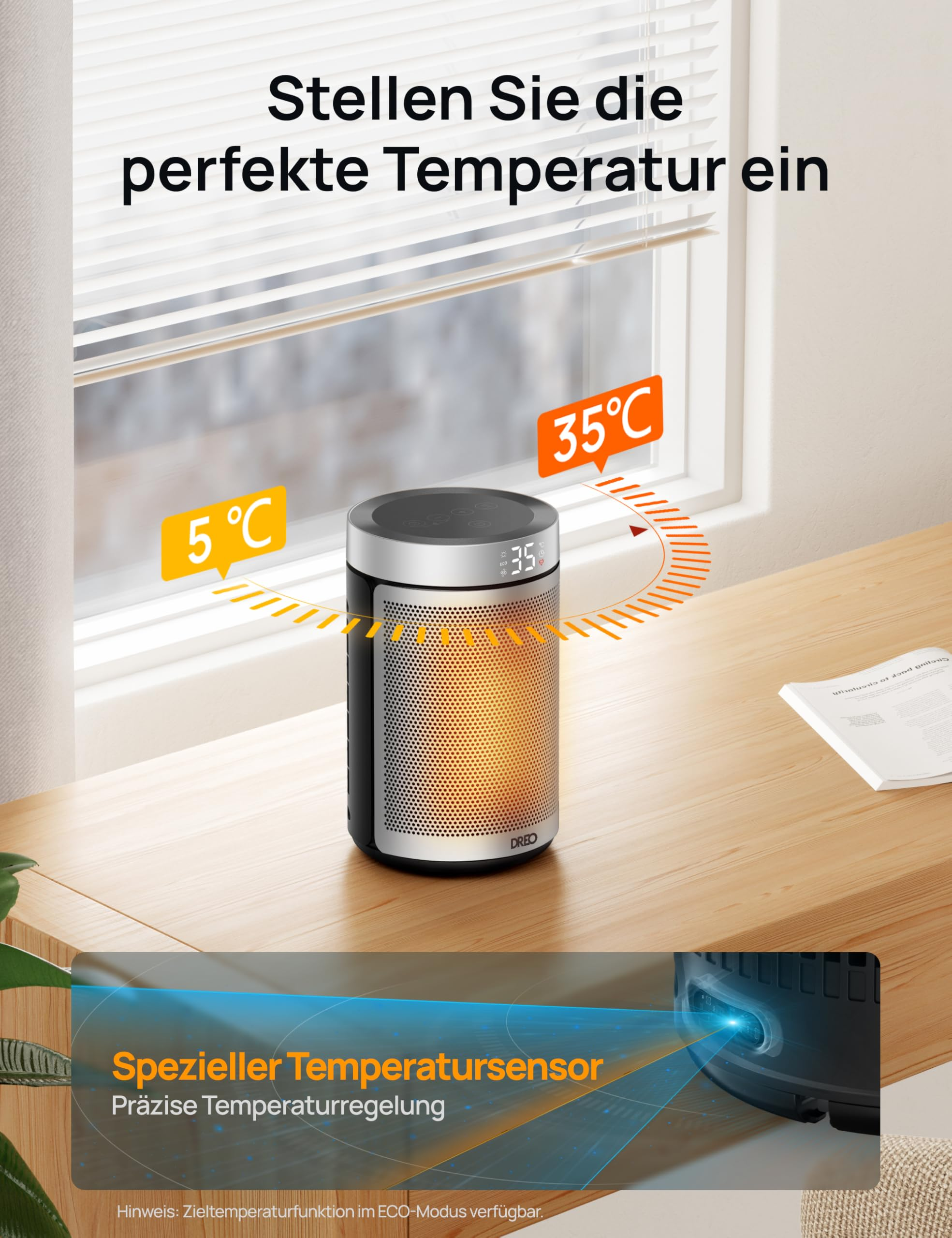 Un radiateur soufflant cylindrique noir et argenté est posé sur un bureau en bois devant une fenêtre.