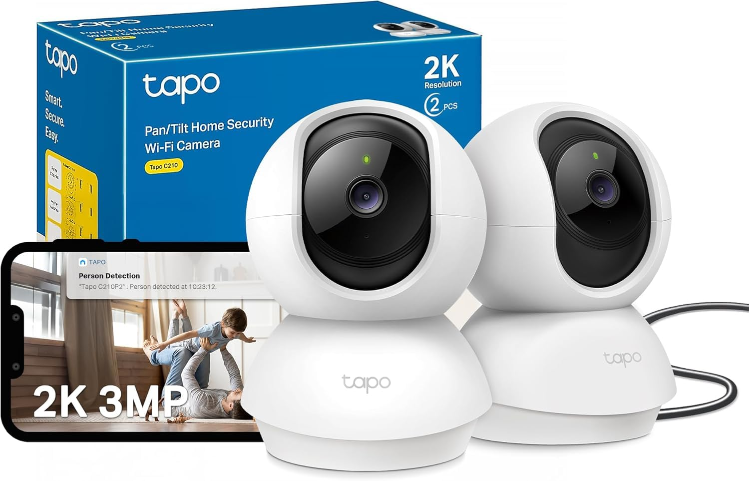 Deux caméras de sécurité Wi-Fi Tapo blanches devant leur boîte et un smartphone avec l'application.