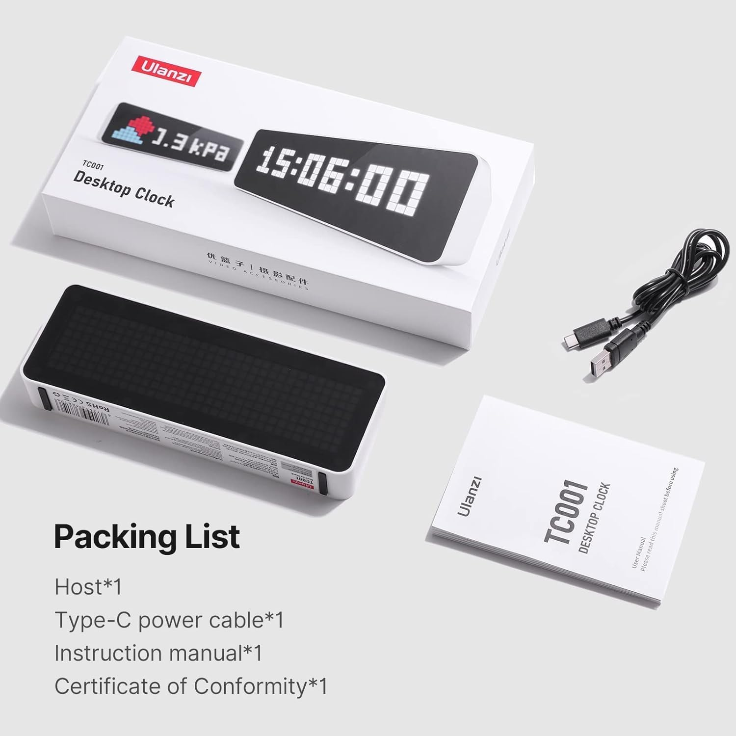 Orologio da tavolo Ulanzi TC001 con confezione, cavo USB-C e manuale su sfondo bianco.