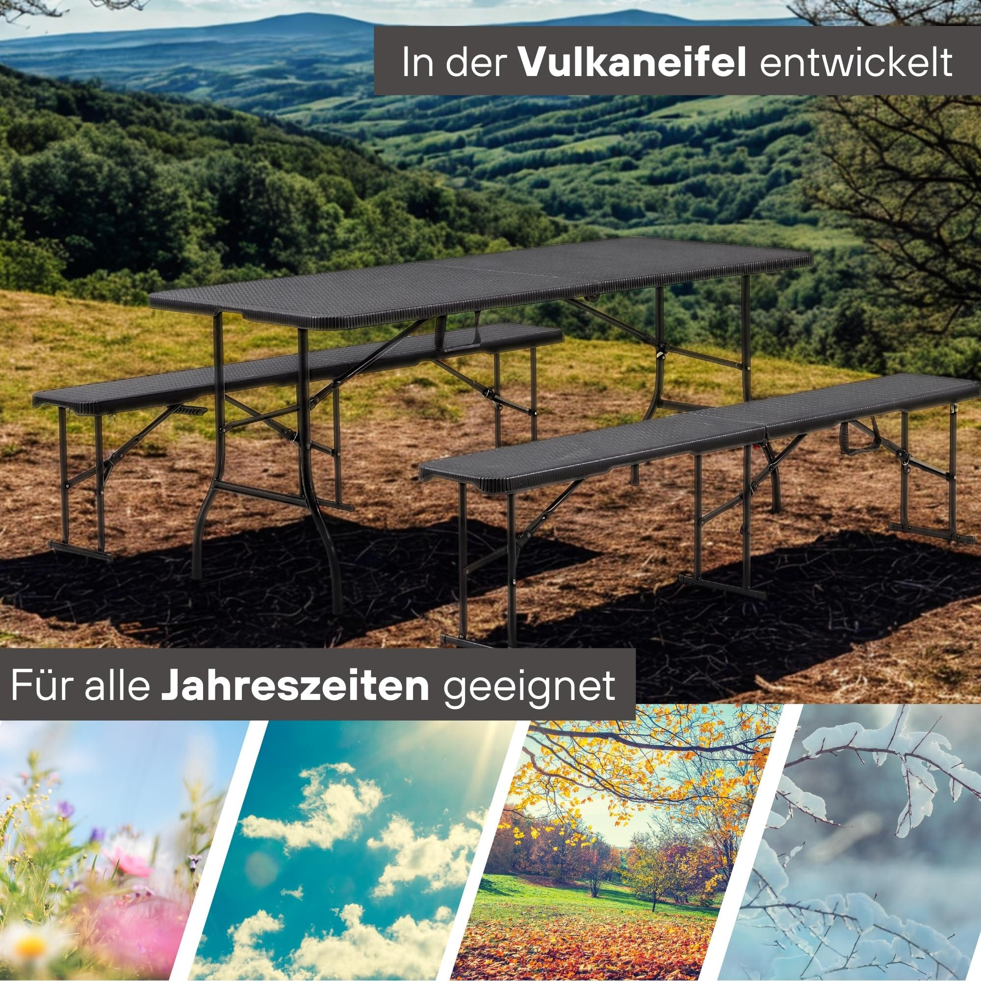 Ein schwarzer Klapptisch mit zwei Bänken steht auf einer Wiese vor einer Hügellandschaft.