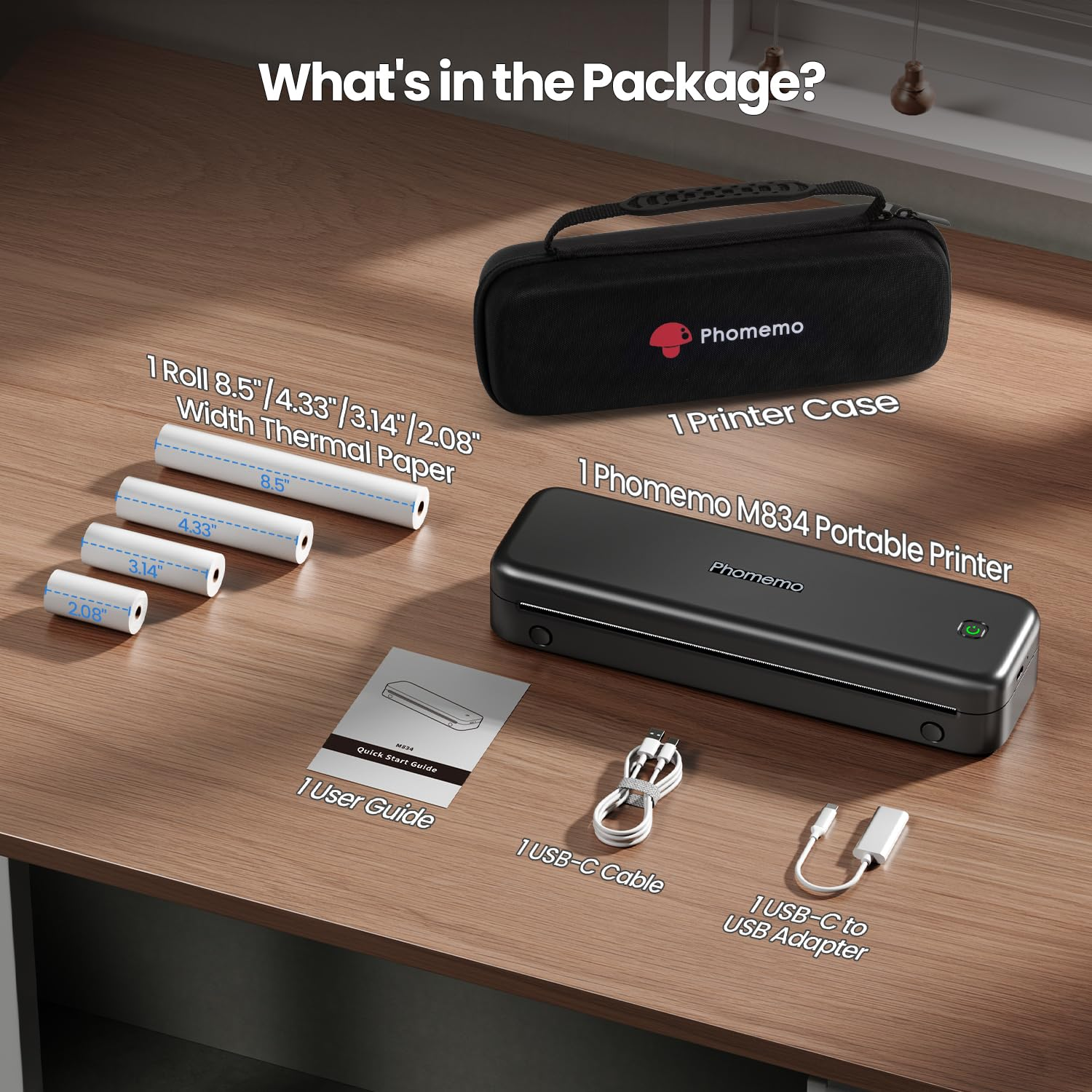 Imprimante portable Phomemo M834, étui, rouleaux de papier thermique, guide, câble USB-C et adaptateur.
