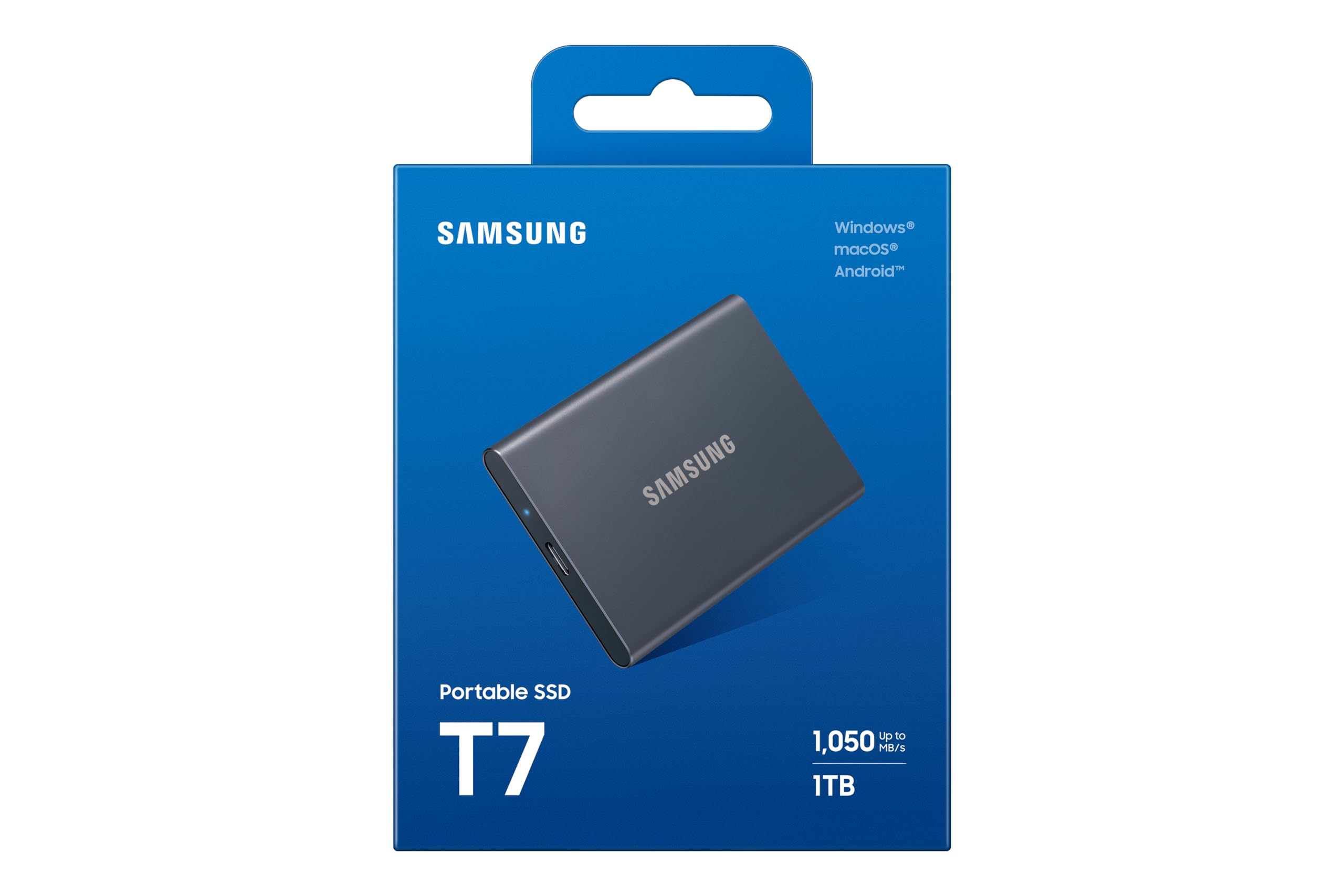 Confezione blu per SSD portatile Samsung T7 grigio, con capacità di 1TB e compatibilità.