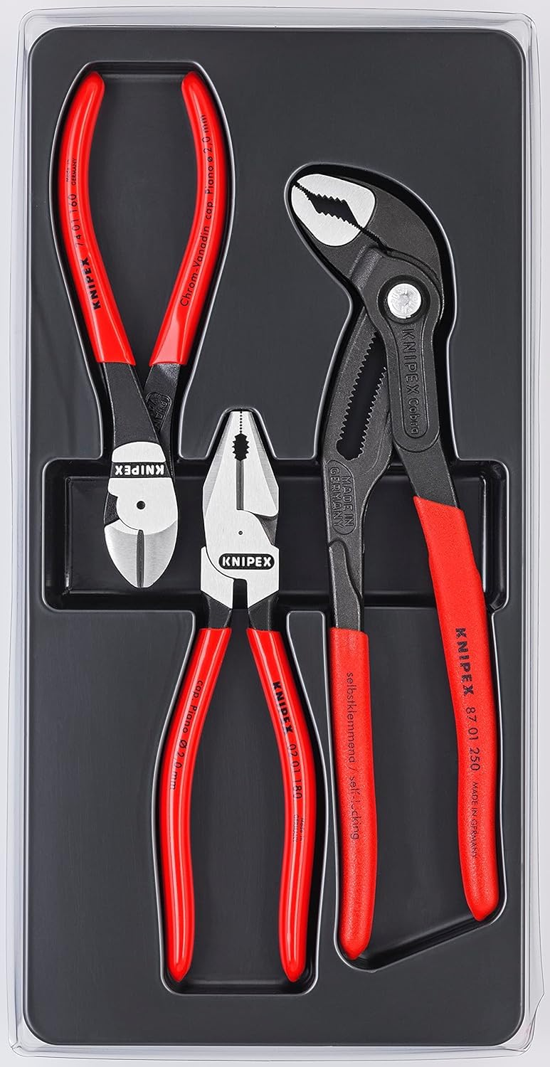 Ein Set mit vier Knipex-Zangen mit roten und schwarzen Griffen in einem geformten Plastiketui.
