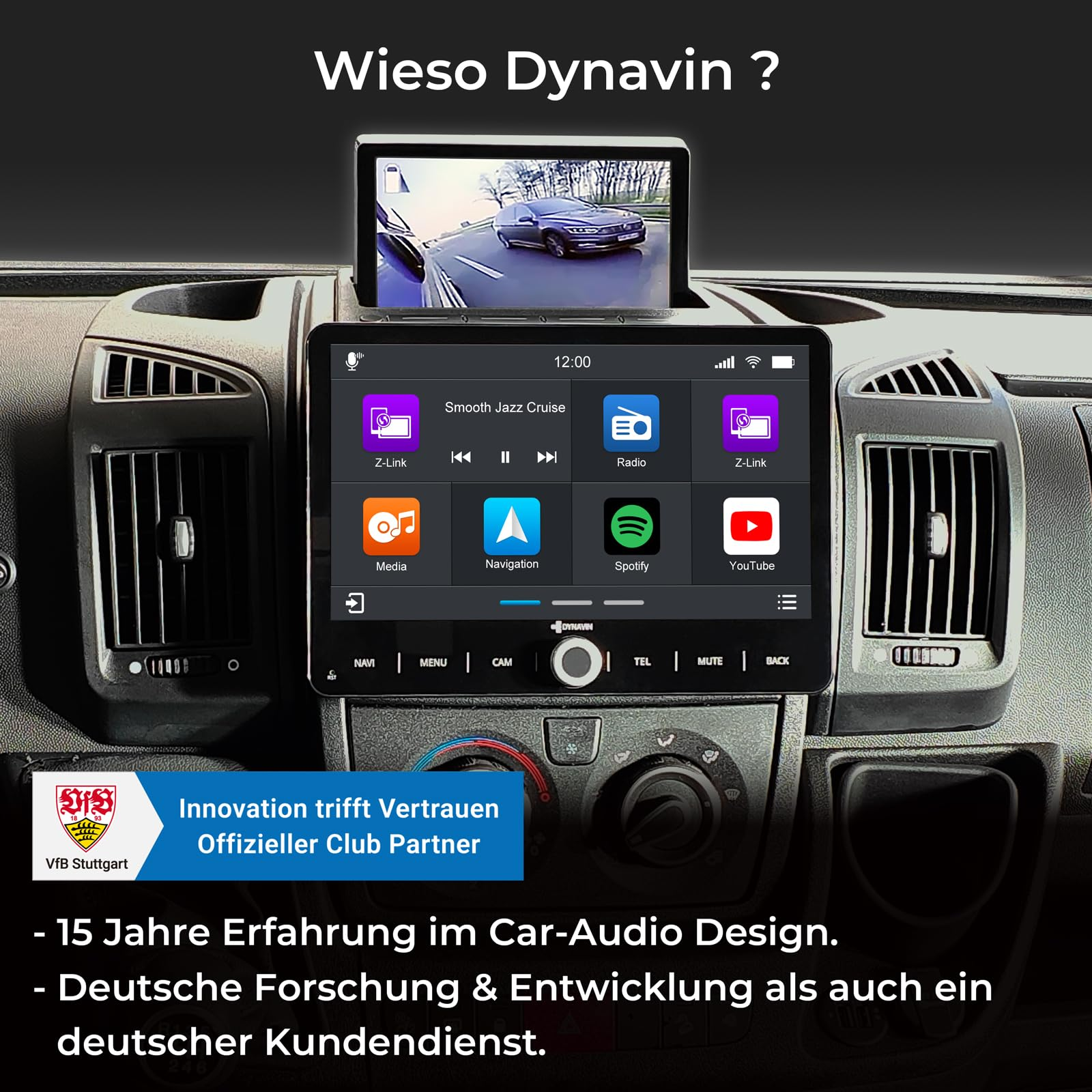 Un autoradio Dynavin dans le tableau de bord affiche des applications comme Navigation et Spotify, avec une caméra de recul.