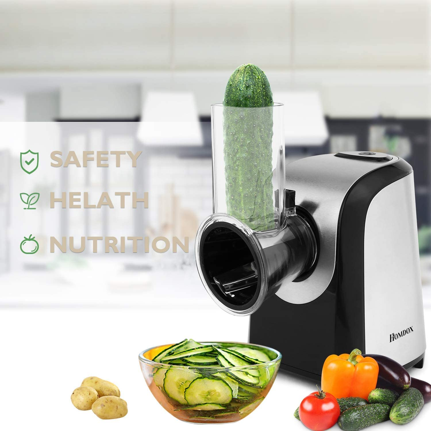 Affettatrice per verdure elettrica con cetriolo e ciotola di fette di cetriolo.