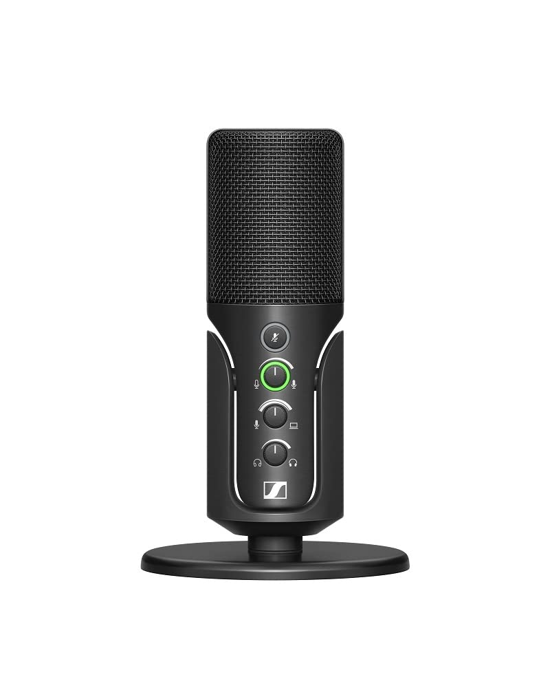 Un microfono USB nero su supporto rotondo con pulsanti di controllo e griglia, isolato su sfondo bianco.