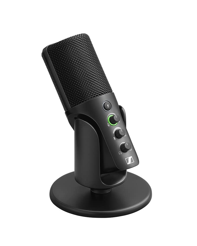 Un microfono da tavolo nero con manopole e base rotonda su sfondo bianco.