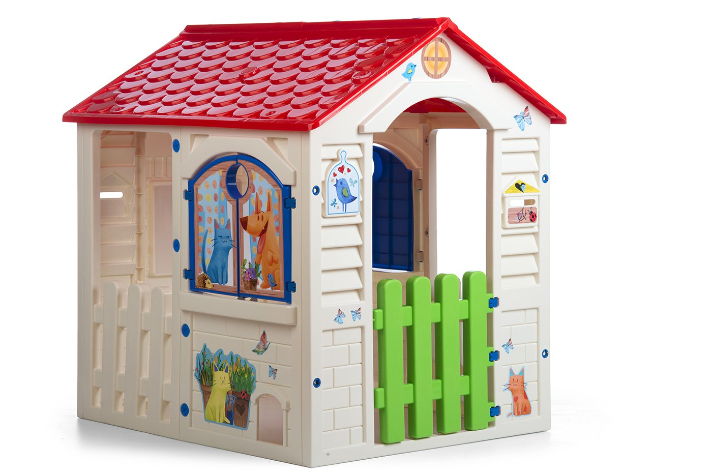 Colorata casetta giocattolo in plastica con tetto rosso, finestre blu e recinzione verde.