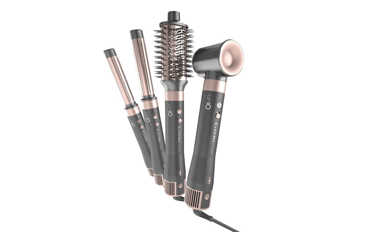 Set di quattro strumenti per lo styling in grigio scuro e oro rosa, tra cui arricciacapelli e asciugacapelli.