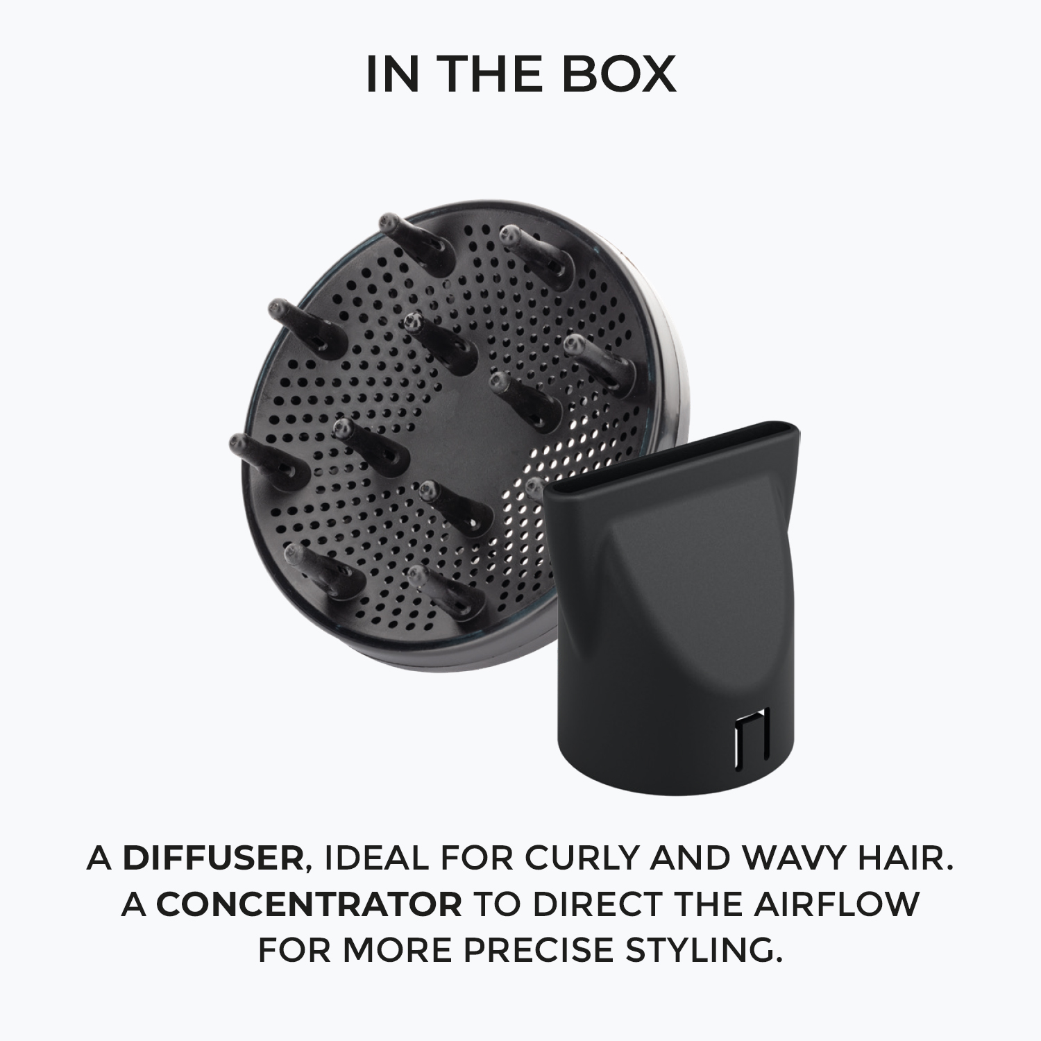 Un diffusore per capelli nero con punte e un concentratore a beccuccio nero coordinato su sfondo bianco.