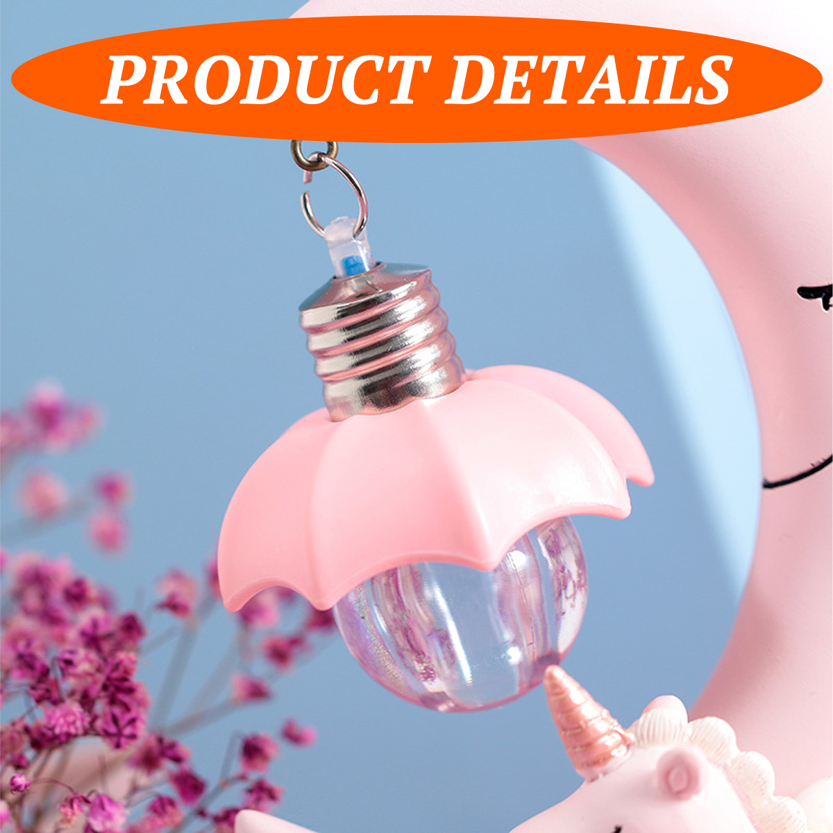 Eine rosafarbene Lampe hängt an einem hängenden Mond mit Einhorn-Design.