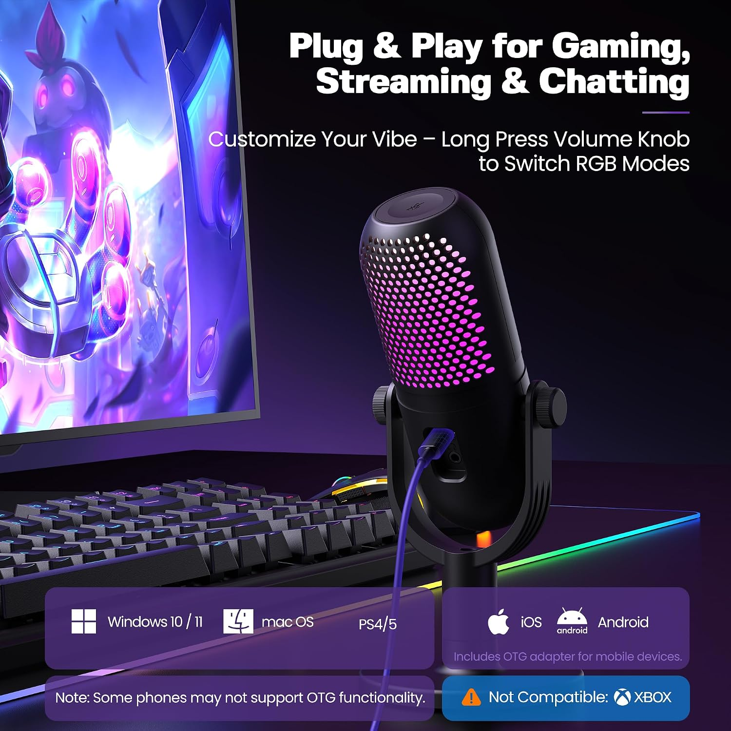 Schwarzes USB-Mikrofon mit RGB-Beleuchtung neben einer Tastatur auf einem lila Schreibtisch.