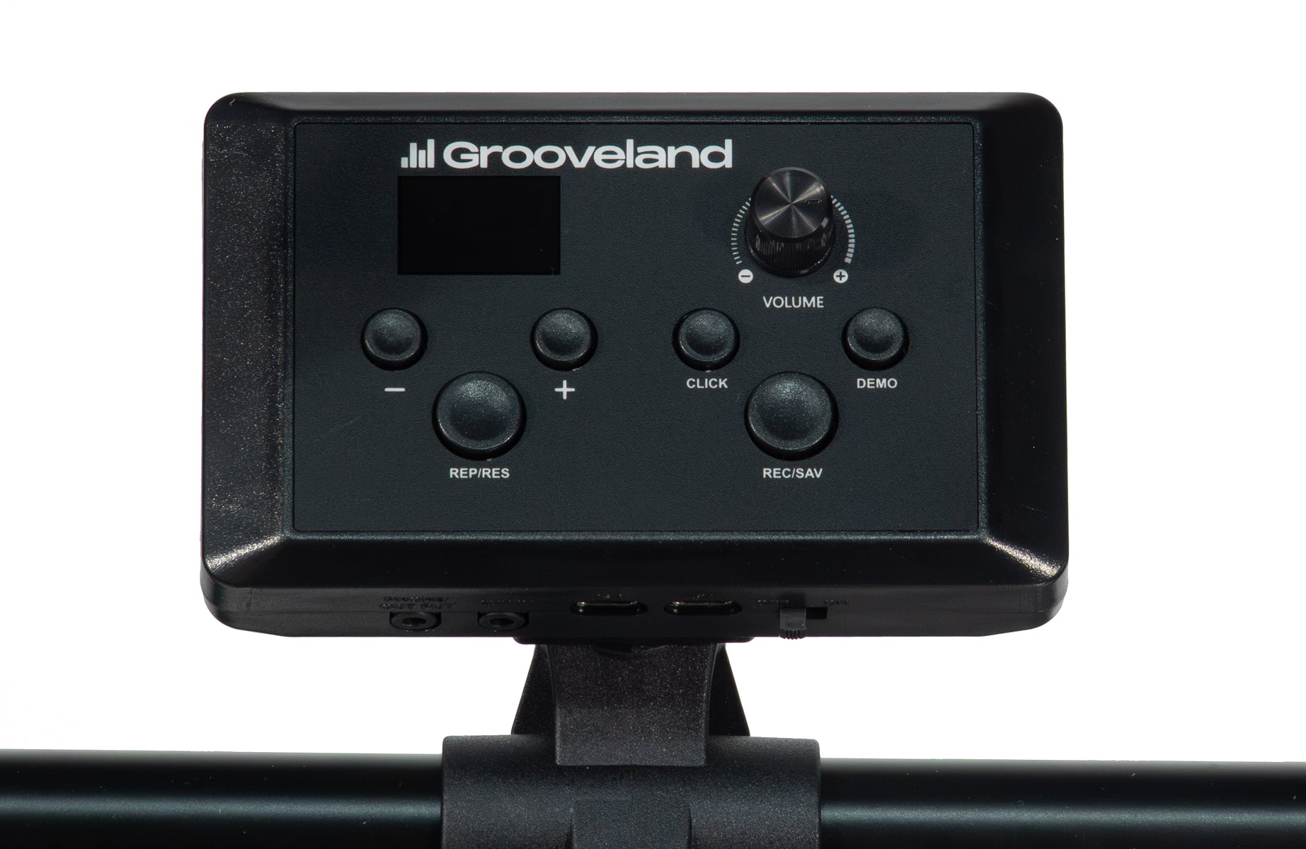 Ein schwarzes Grooveland Musiksteuergerät mit Tasten, Display und Lautstärkeregler auf einem Stativ.