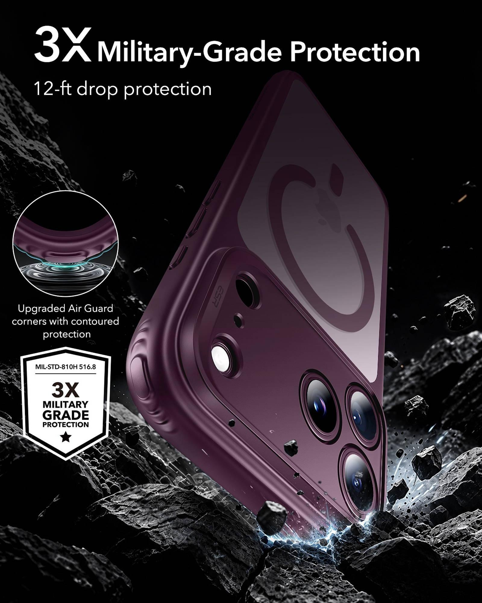 Ein violettes Smartphone in einer robusten Hülle inmitten von dunklen Steinen mit Text für Sturzschutz.