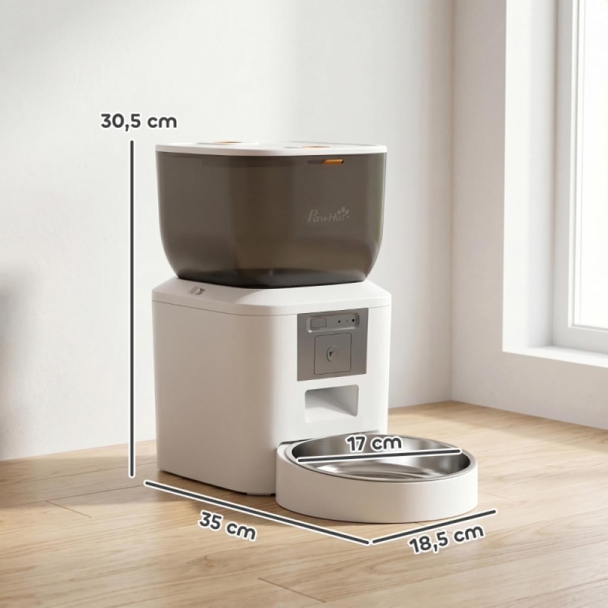 Weiß-grauer automatischer Futterautomat mit Maßen 30,5x35x18,5 cm und Metallschüssel auf Holzboden.
