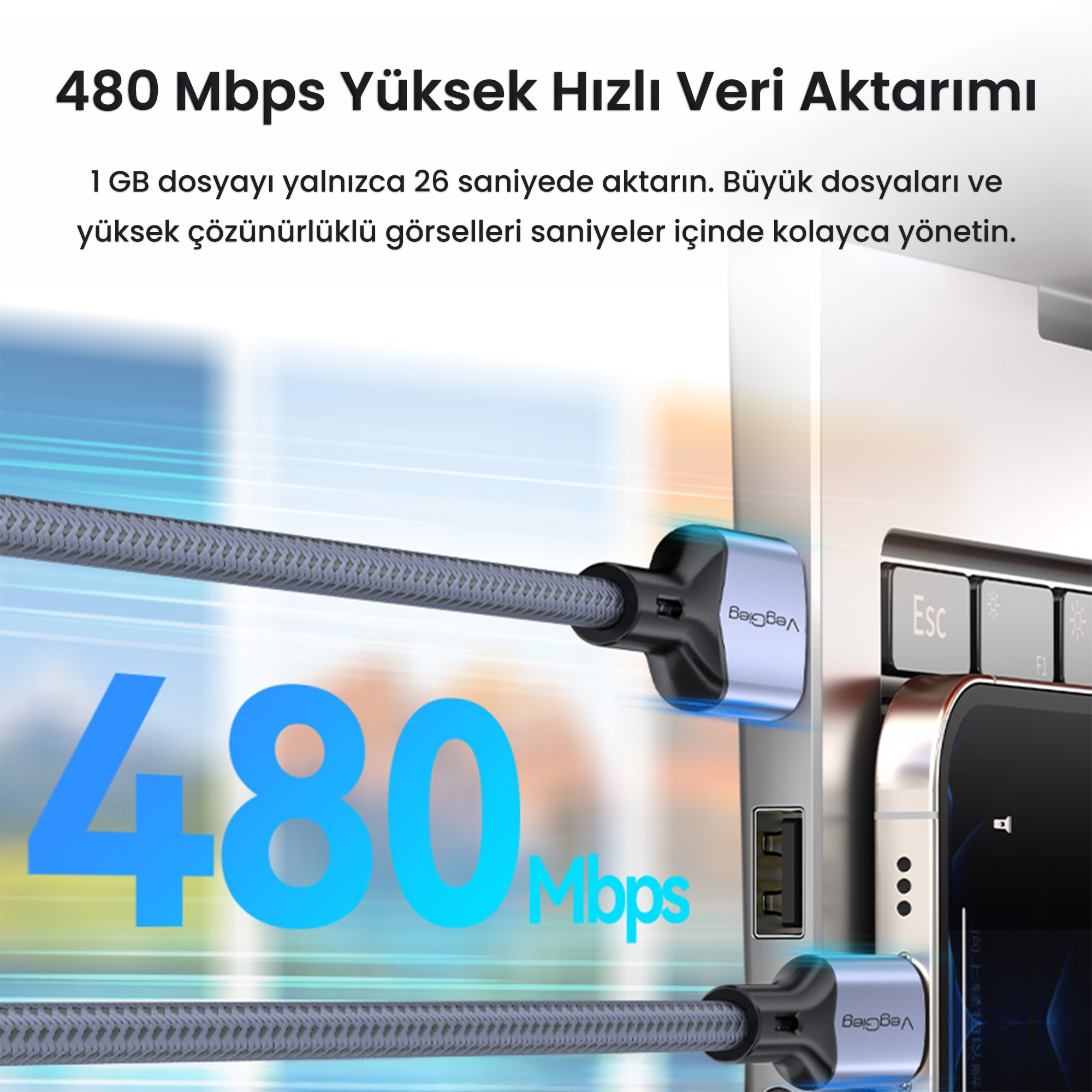 Metal başlıklı gri USB kablosu dizüstü bilgisayara takılı, 480 Mbps yazılı.